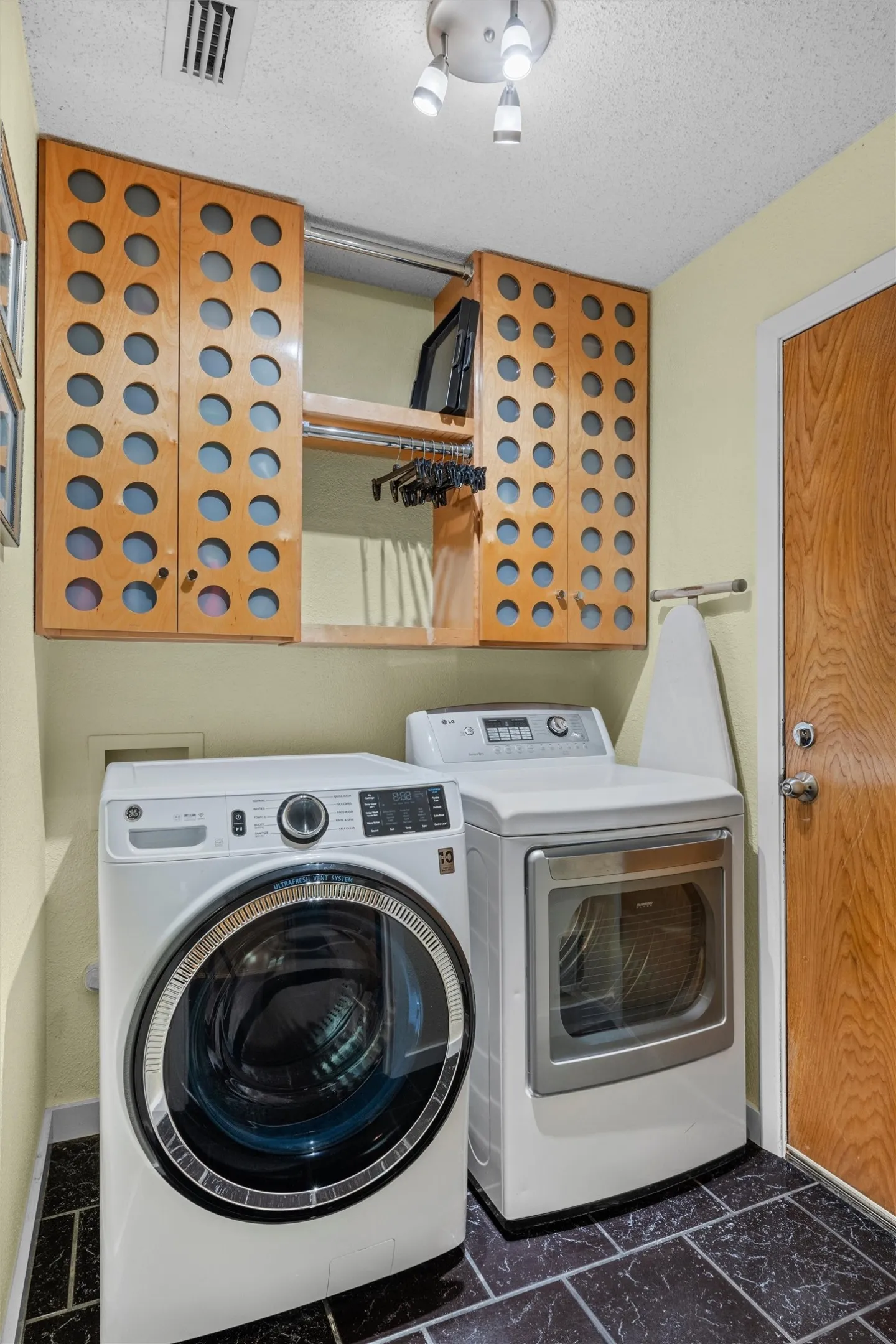 Custom cabinetry in utility room.