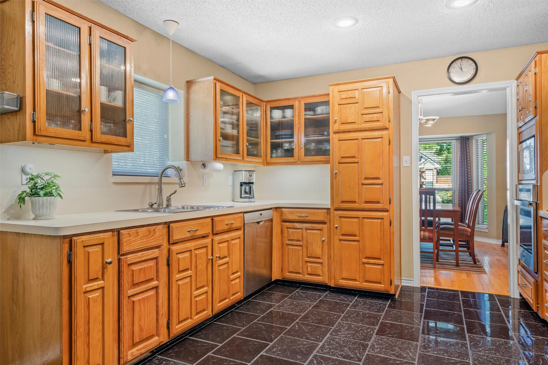 Glass front cabinets, large counterspace area..
