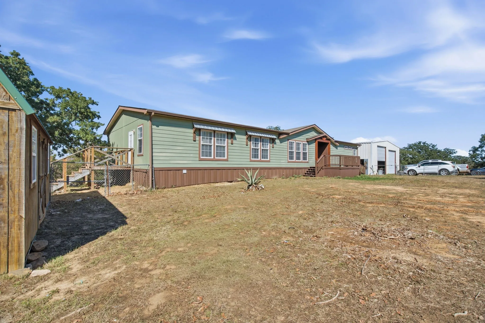 Mobile Home For Sale in Wise County , 664 County Road 4756, Boyd, Texas 76023, 4 Bedroom, 2 Bathroom, Garage spaces, 2,380 Sqft, built in 2015, mls#21402867, Real Estate Agent in Boyd, Homes For Sale in Wise county, Homes For Sale in Boyd, Realtor in Boyd Texas, Real Estate Brokerage Independent Realty Texas, Luminita Cordes Realtor