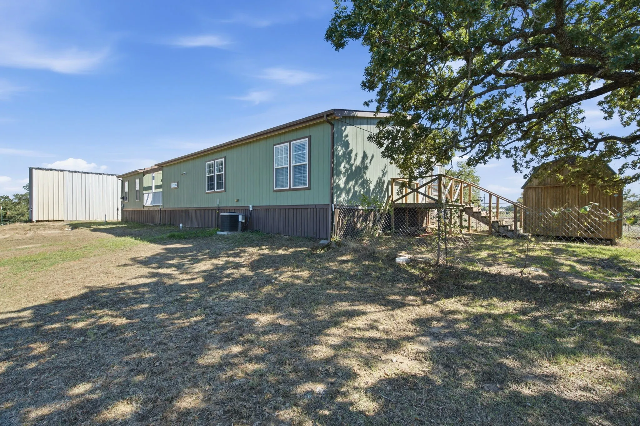 Mobile Home For Sale in Wise County , 664 County Road 4756, Boyd, Texas 76023, 4 Bedroom, 2 Bathroom, Garage spaces, 2,380 Sqft, built in 2015, mls#21402867, Real Estate Agent in Boyd, Homes For Sale in Wise county, Homes For Sale in Boyd, Realtor in Boyd Texas, Real Estate Brokerage Independent Realty Texas, Luminita Cordes Realtor