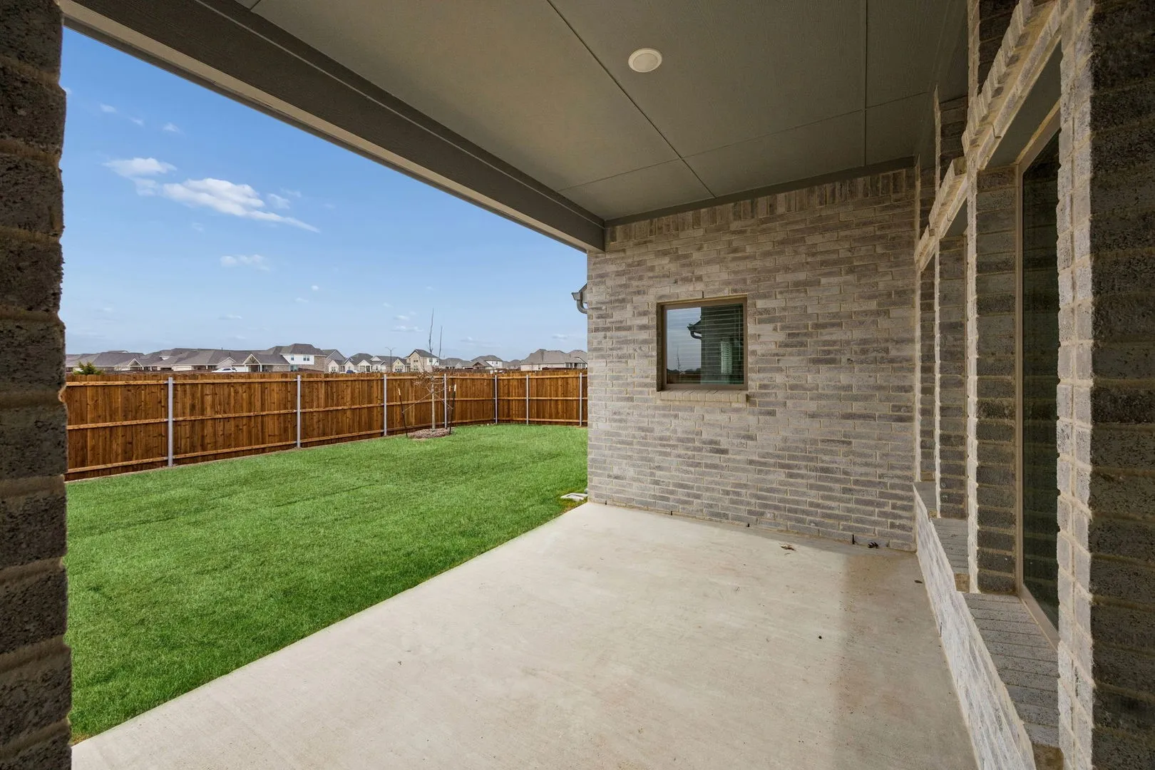 Covered Patio in the Gilmour II home plan – REPRESENTATIVE PHOTO
