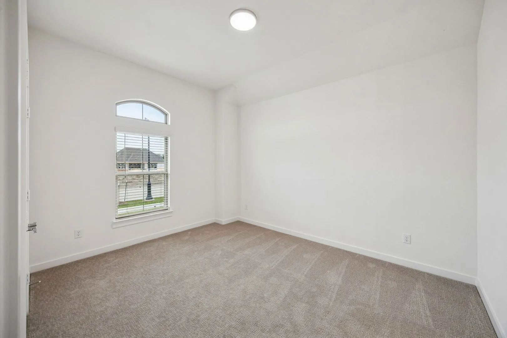 Bedroom in the Gilmour II home plan – REPRESENTATIVE PHOTO