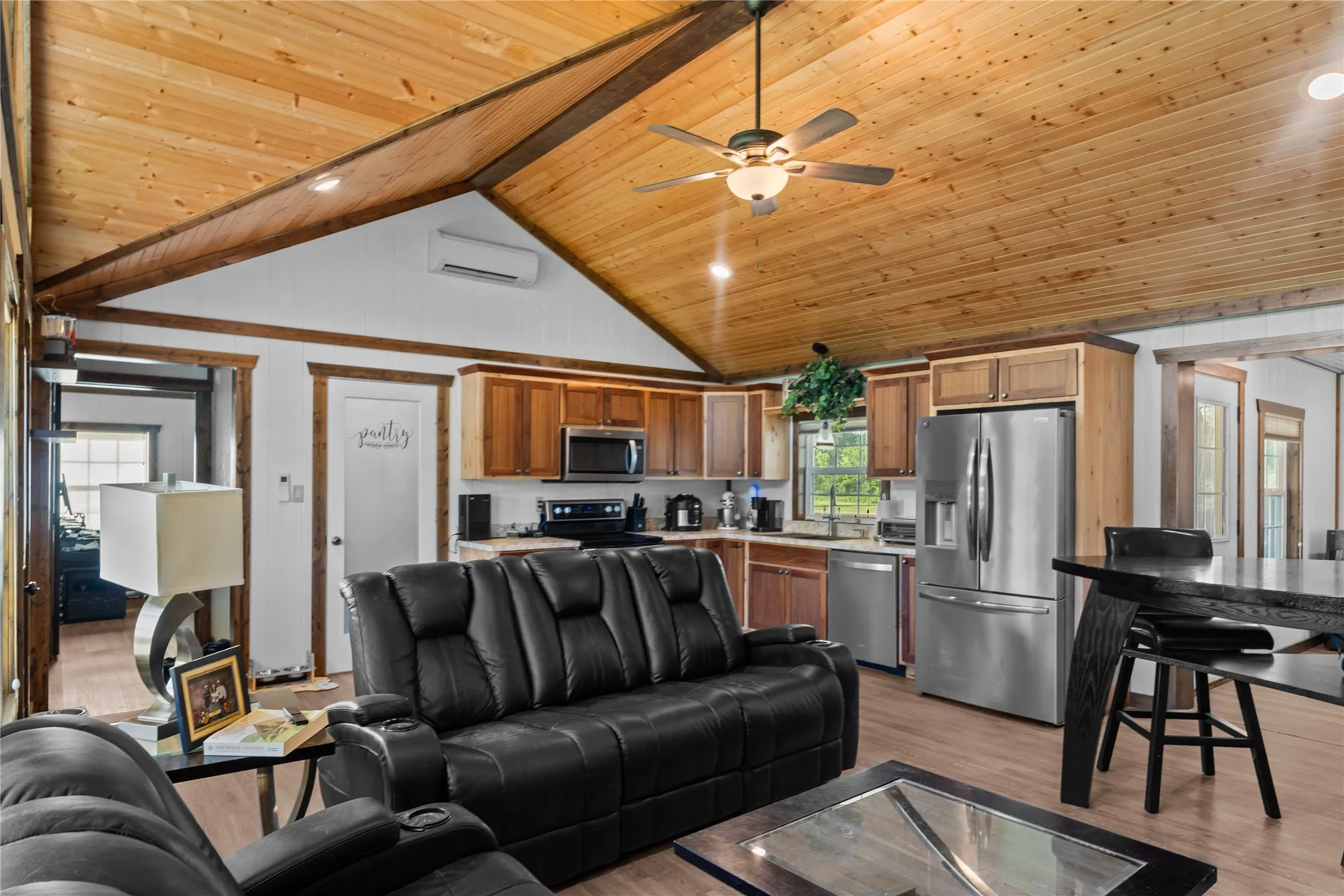 Open concept living with gorgeous vaulted ceilings
