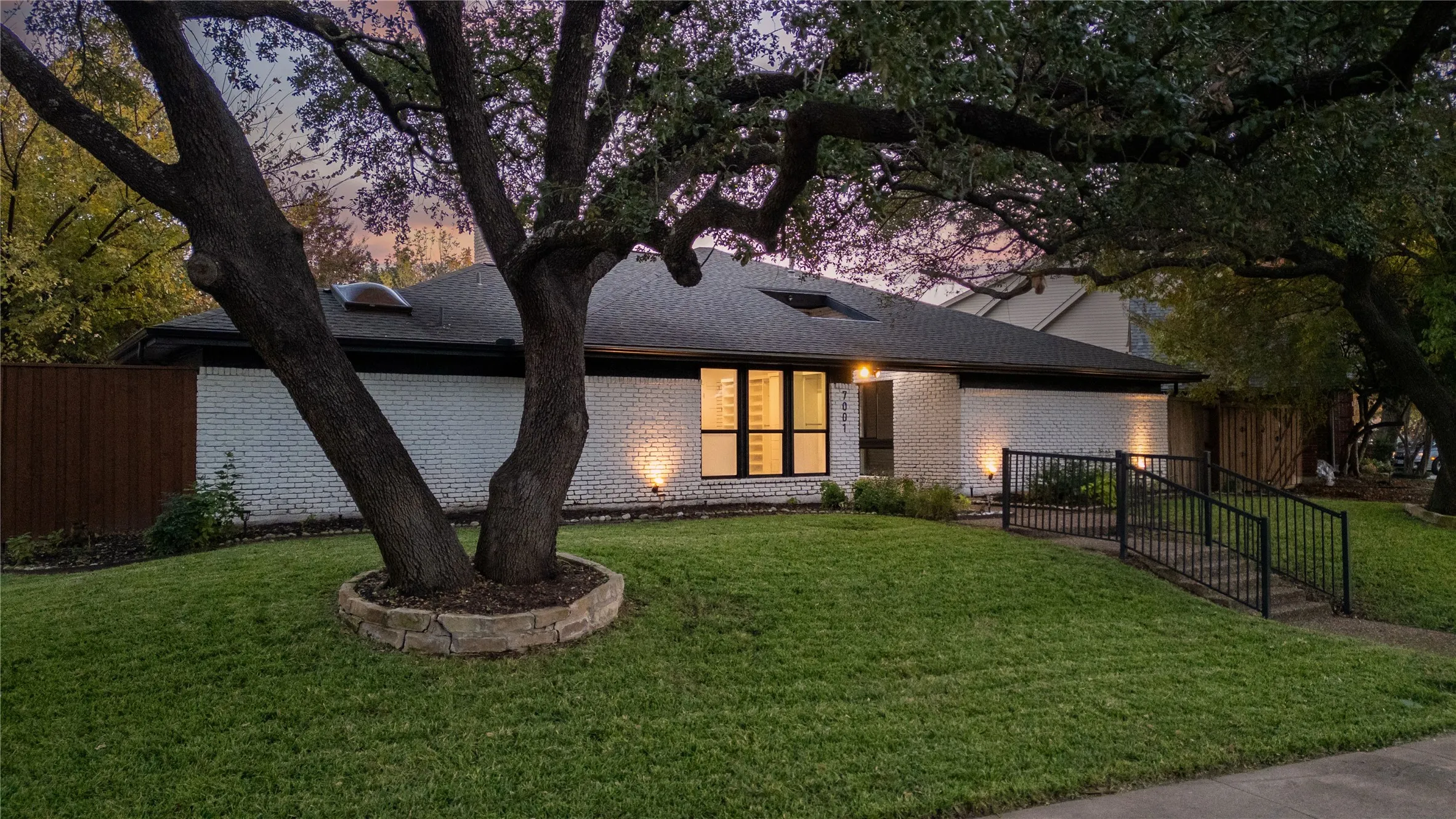 View of front of property featuring a yard