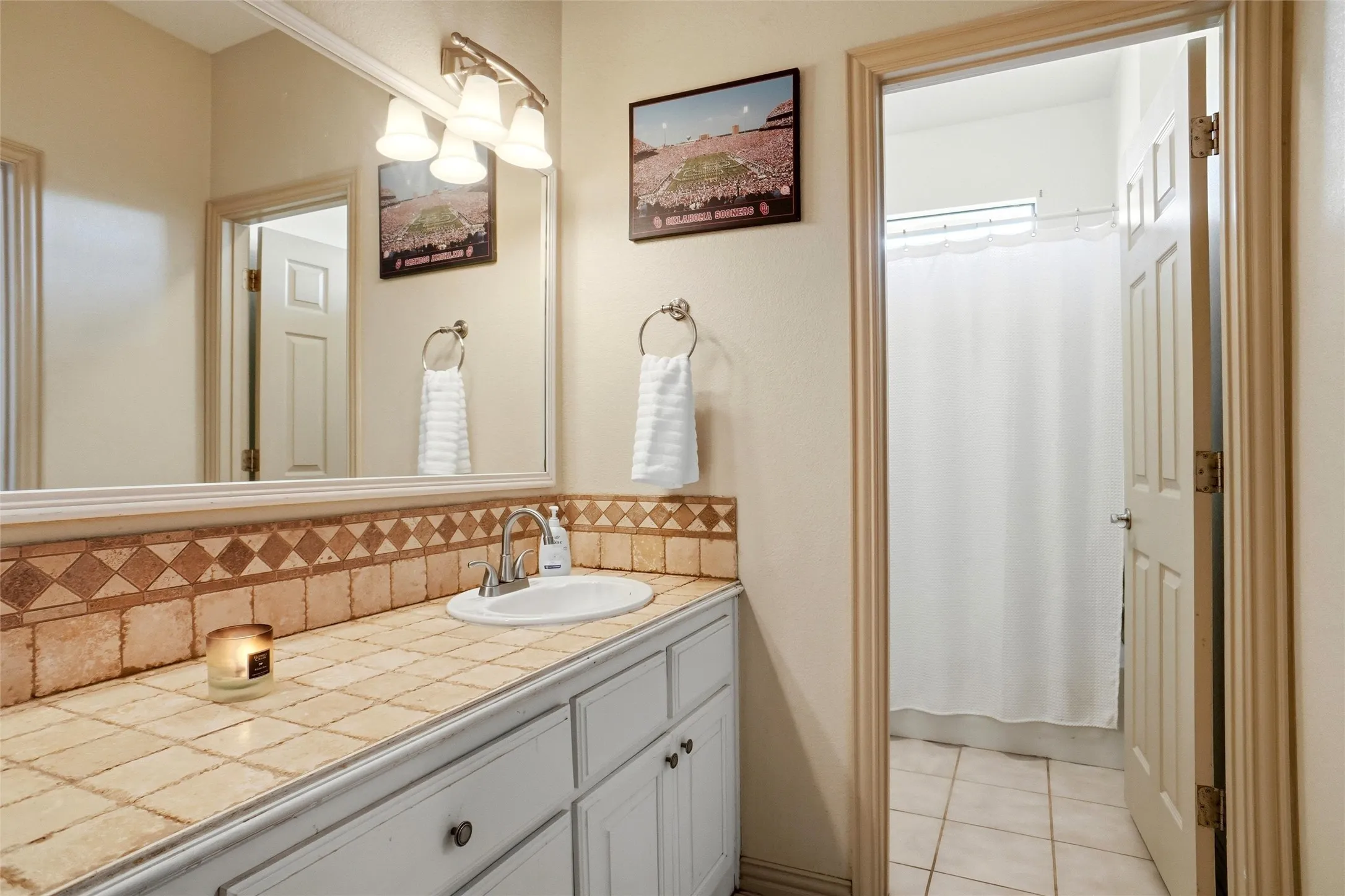 Secondary bath; home has three full baths, one is jack-and-jill between secondary bedrooms.