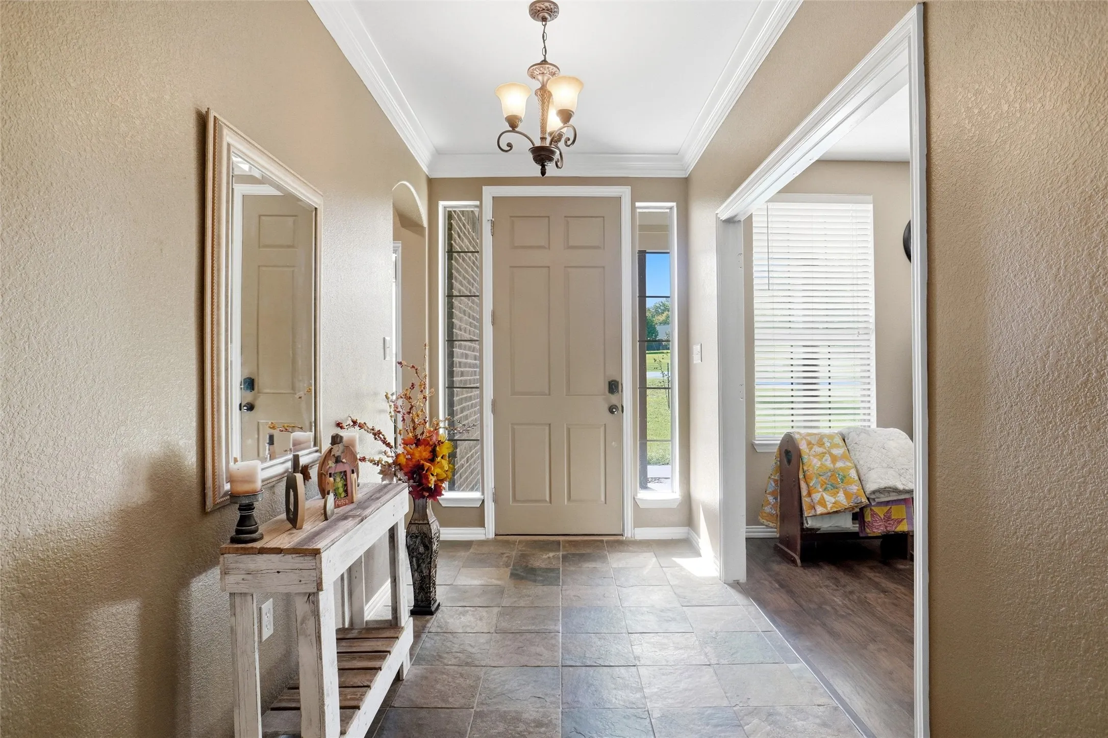You're home! Entry with tile flooring; office or dining to right of photo