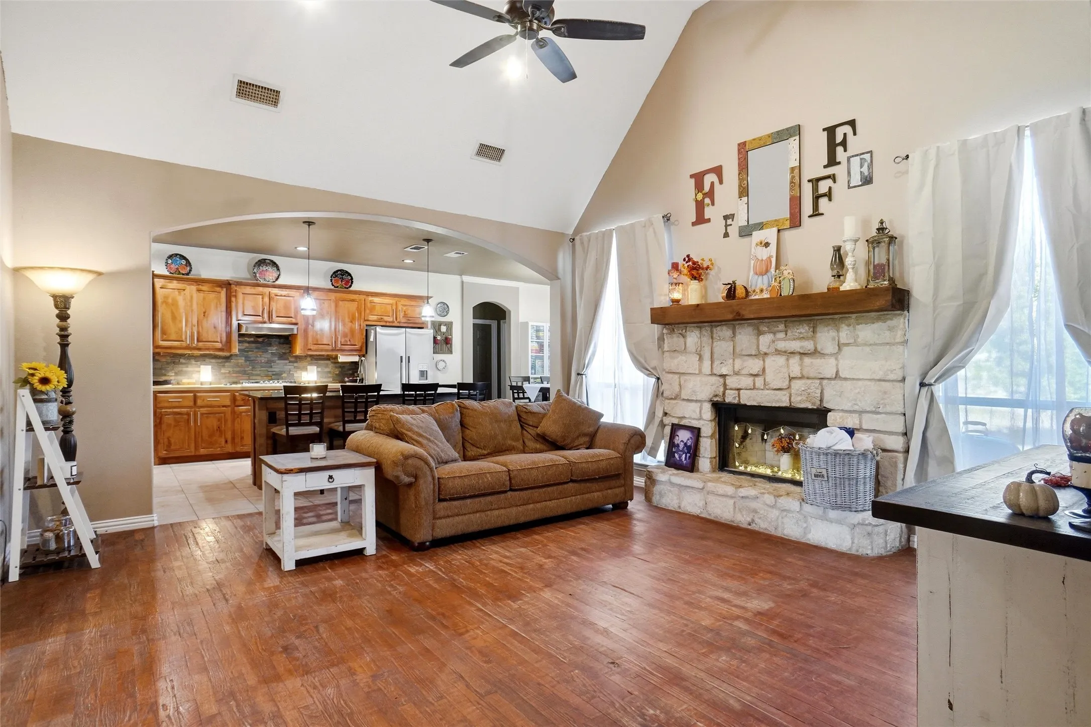 Living room with view of kitchen beyond.
