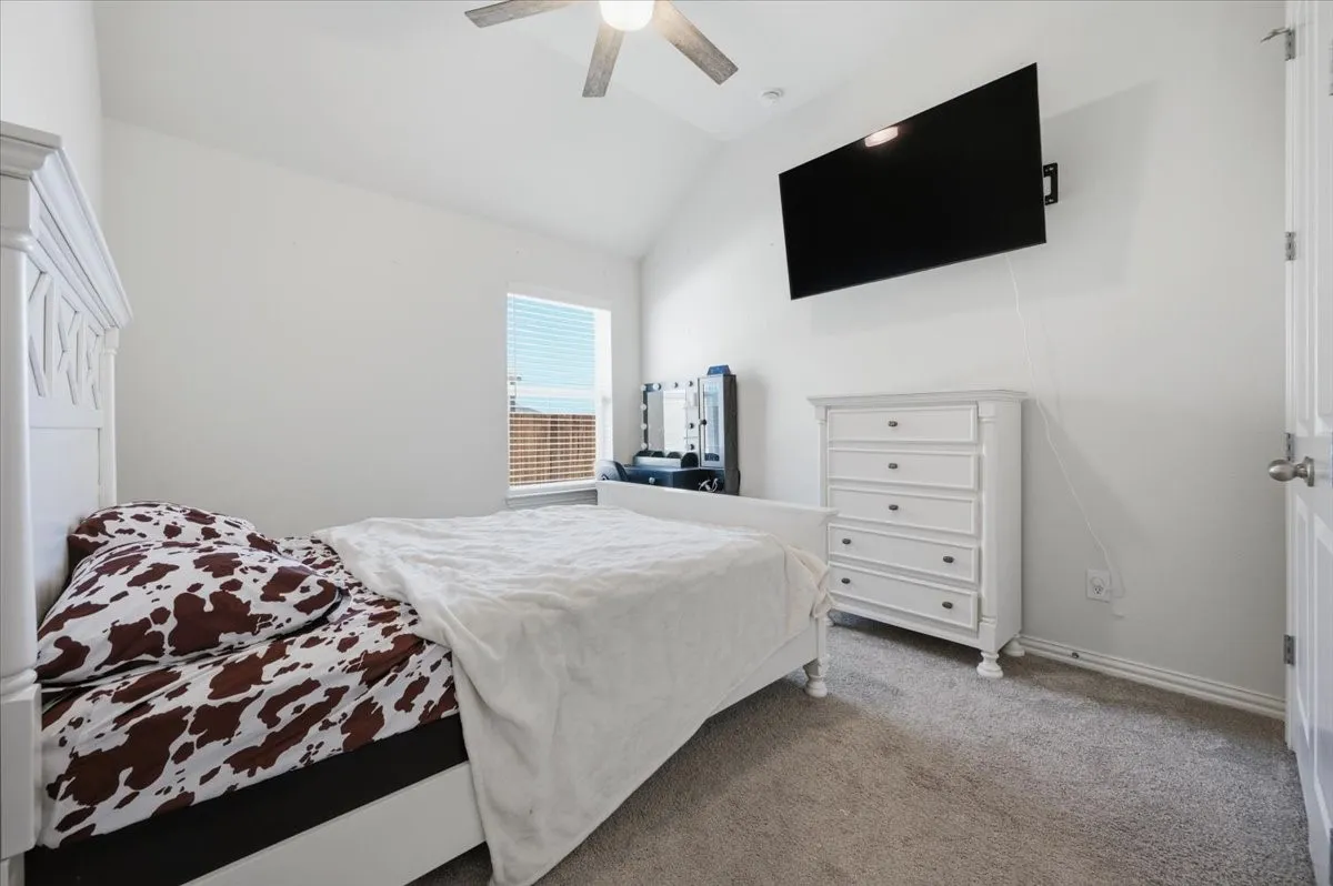 Sloped ceiling and neutral wall tones