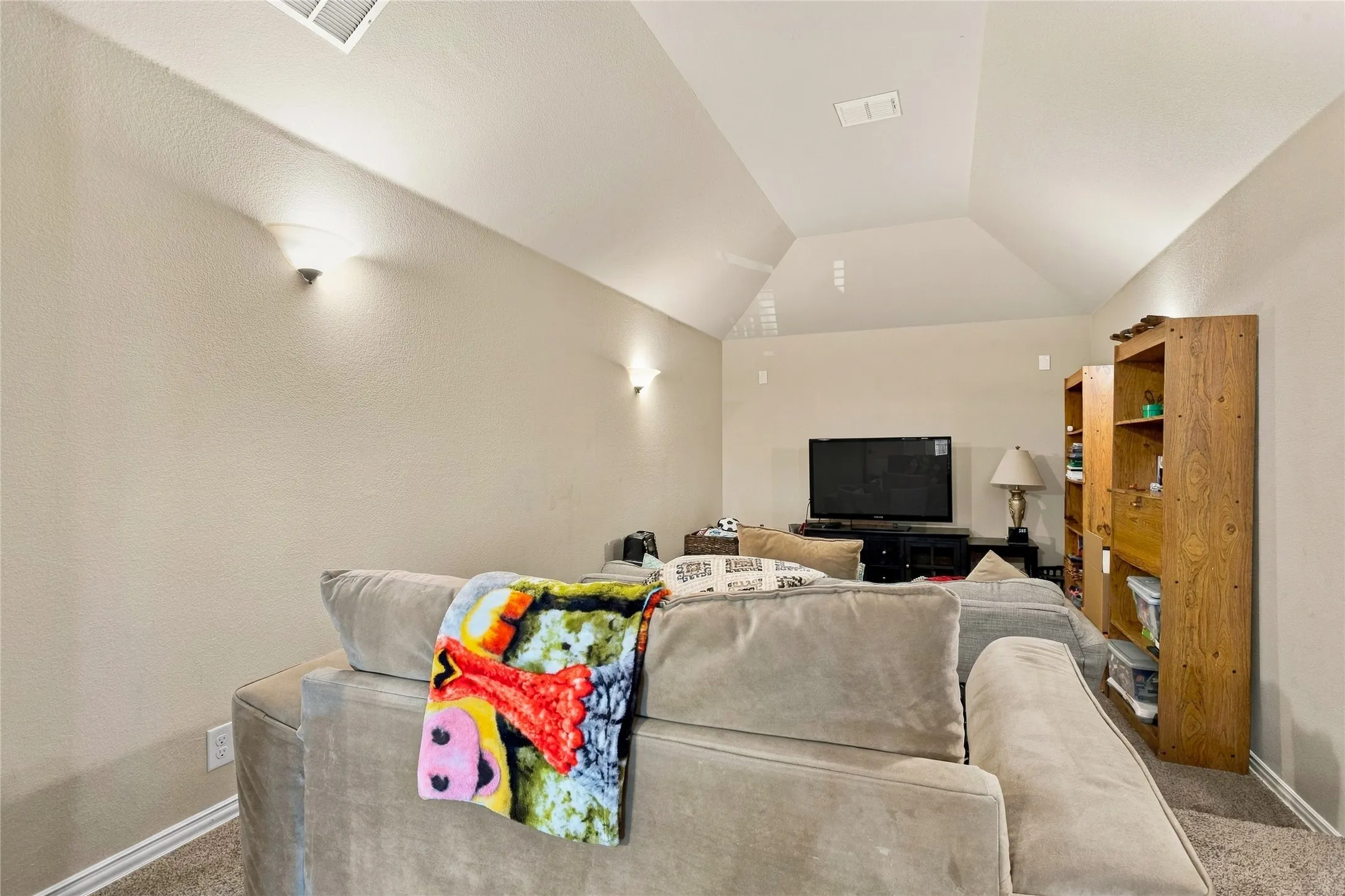 Spacious bonus room offering flexible use for a variety of needs.