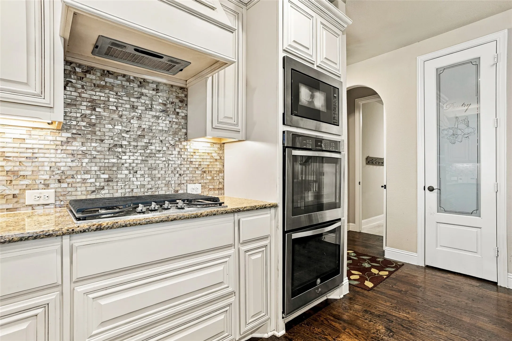 Additional kitchen view highlighting cabinetry and workspace.