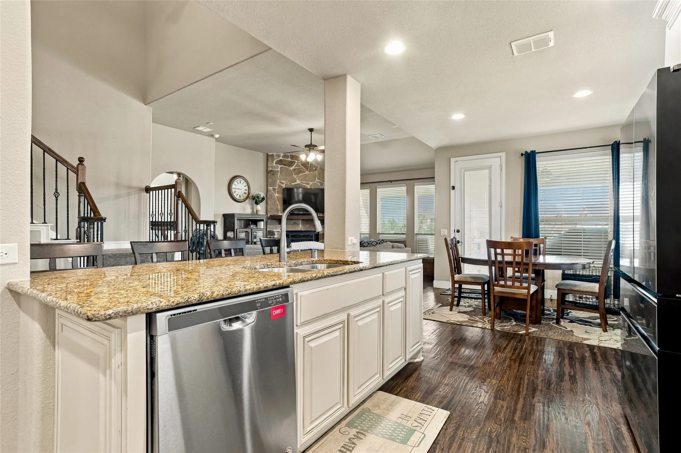 Open kitchen layout offering functionality and room to gather.