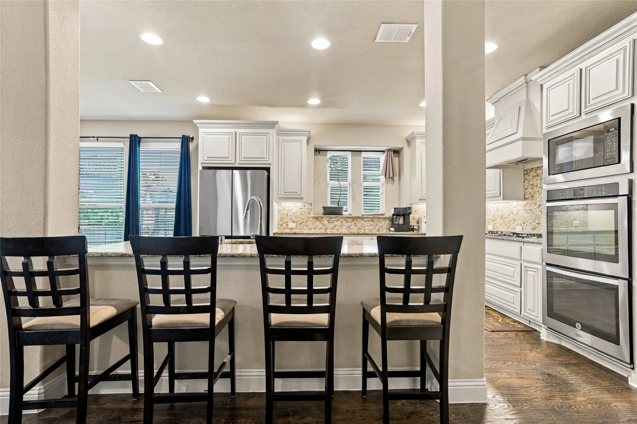 Open kitchen layout offering functionality and room to gather.