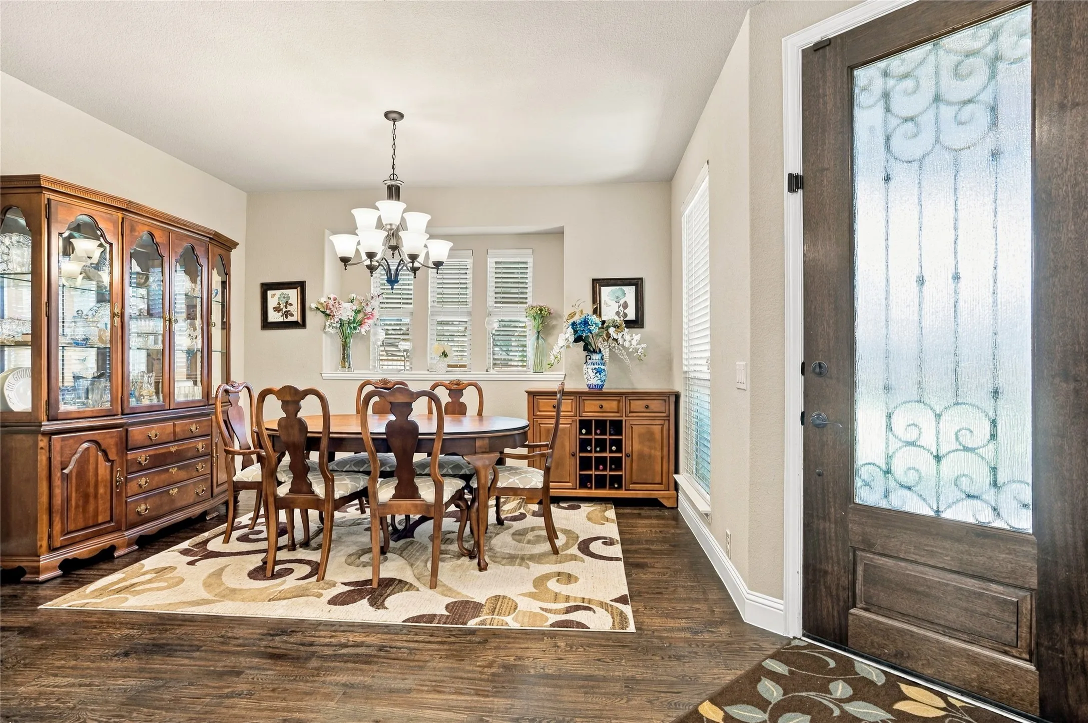Elegant formal dining area with beautiful natural light.