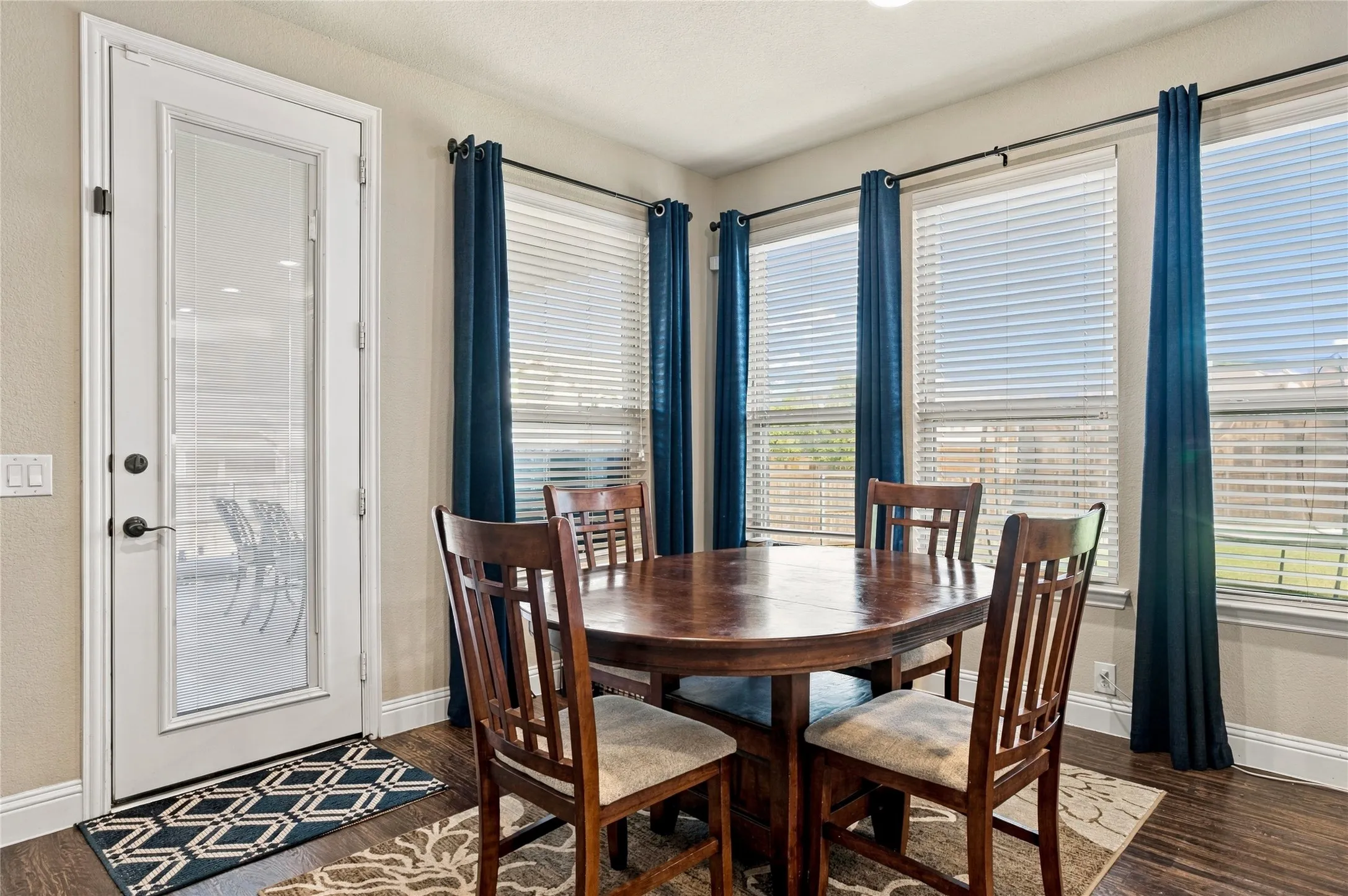 Versatile dining space with views of the backyard.