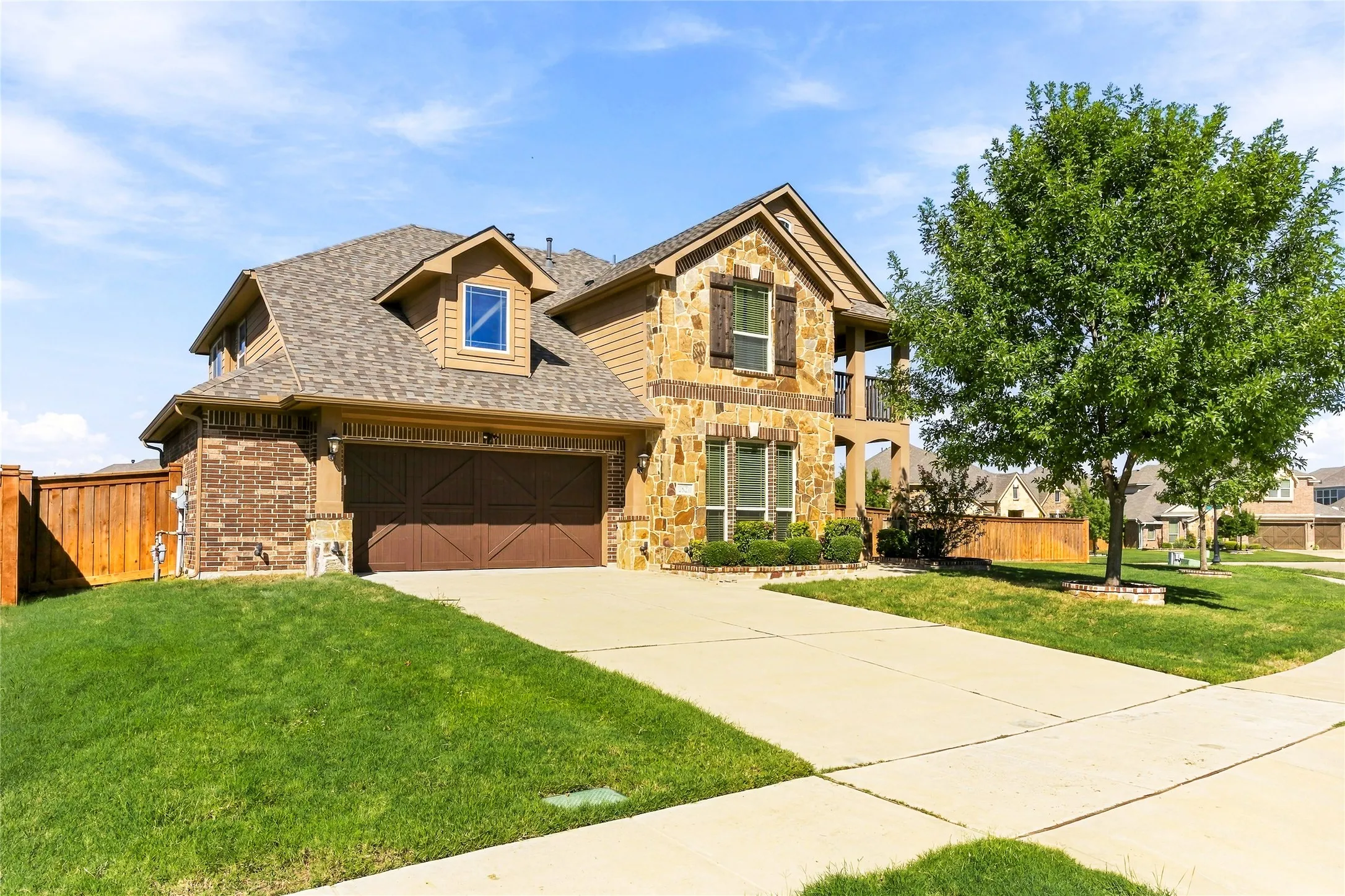 Beautiful brick exterior with inviting curb appeal and a welcoming front entry.