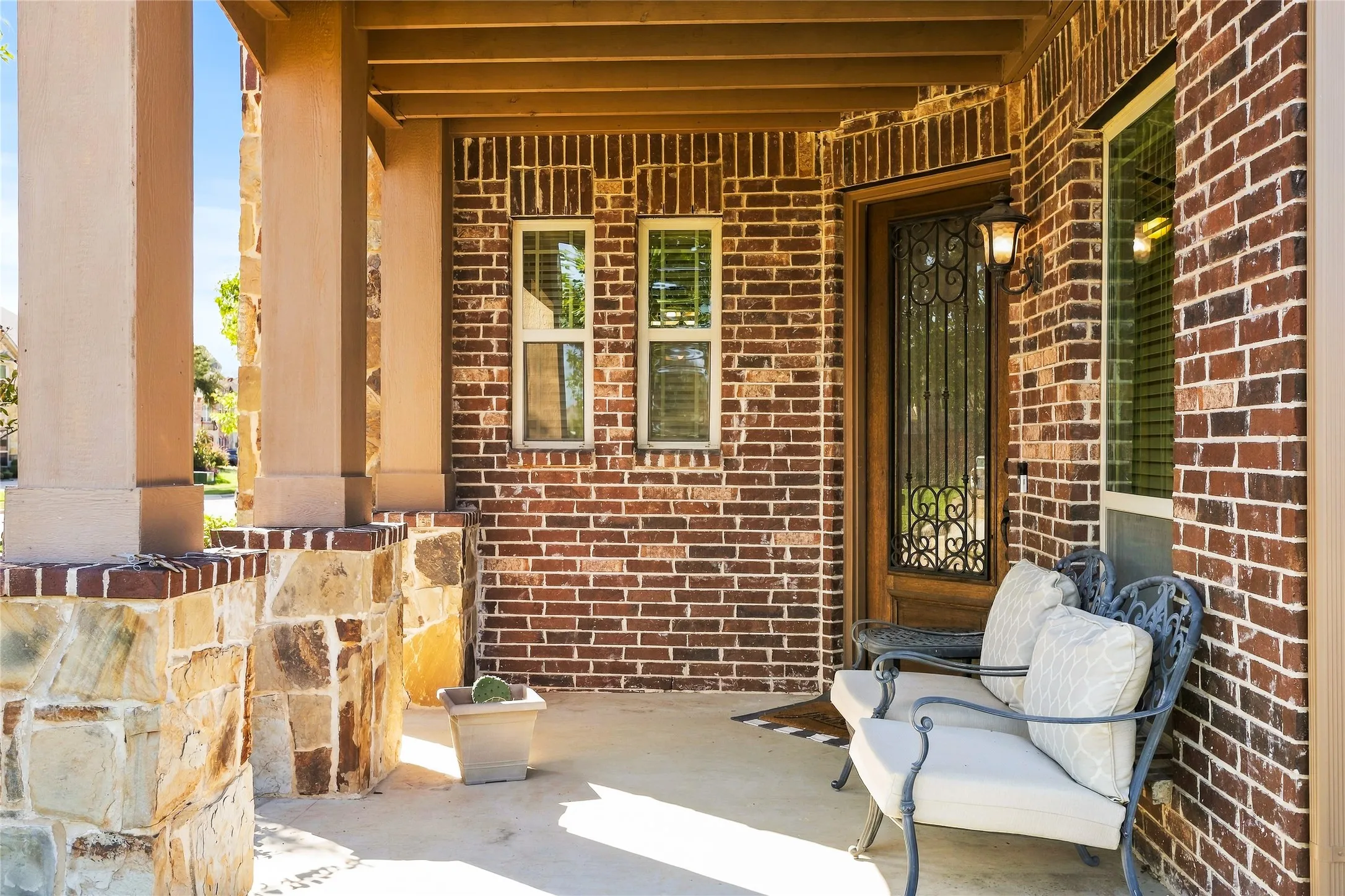 Welcoming covered front porch with room to relax and unwind.