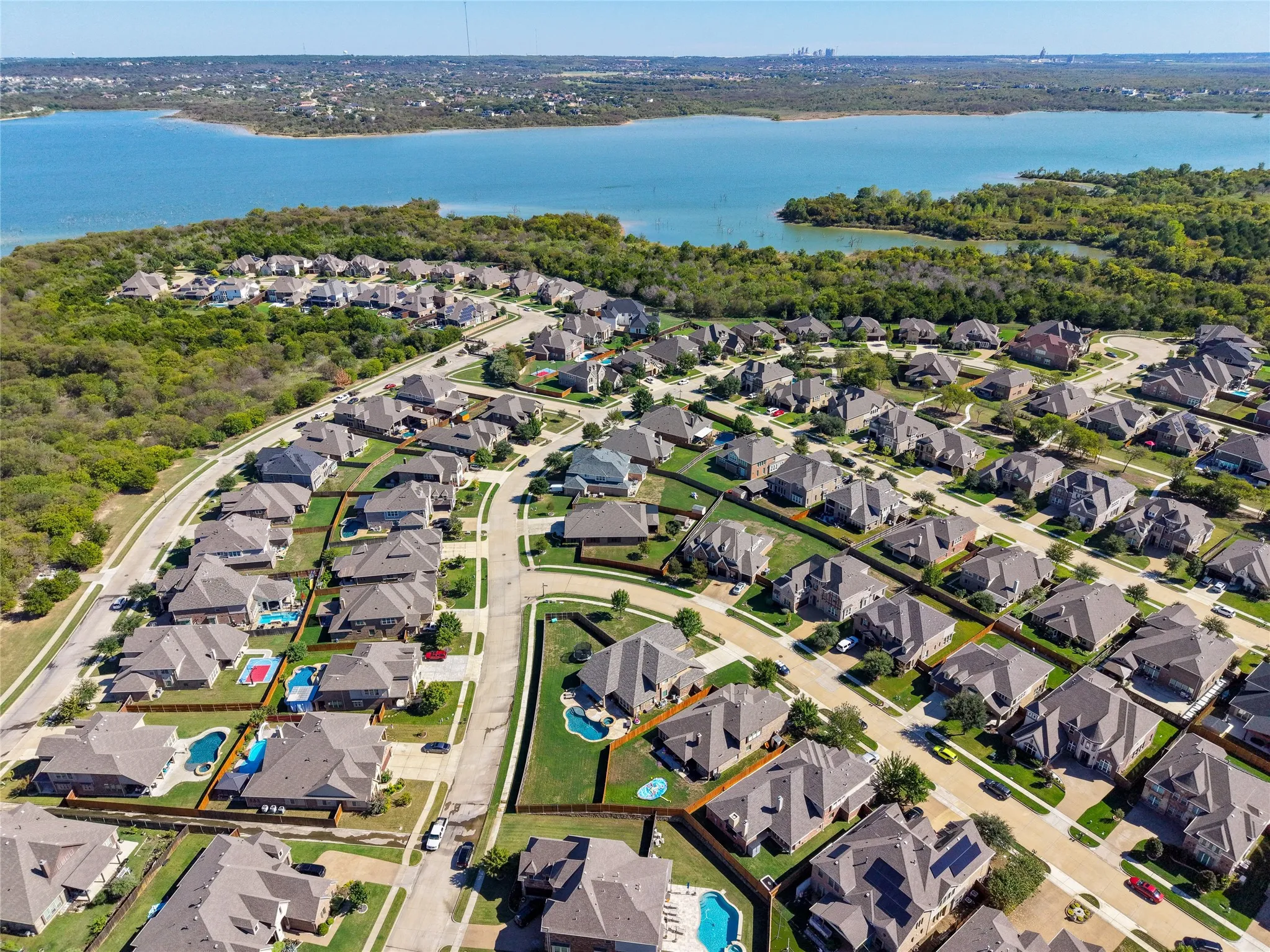 Additional aerial view capturing the neighborhood and surrounding landscape.
