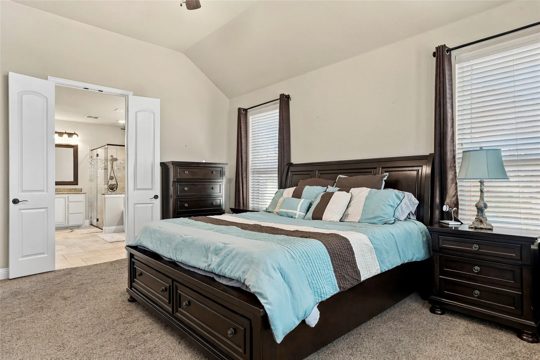Additional view of the primary suite showcasing its generous layout.
