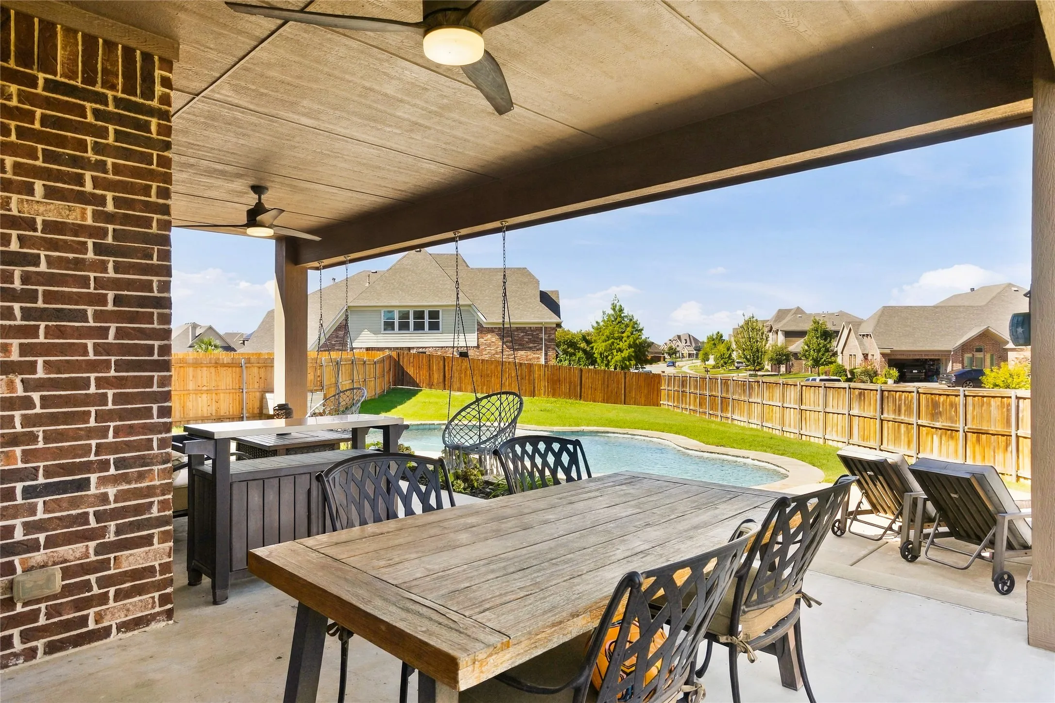 Covered patio offering a setting for outdoor dining and entertaining.
