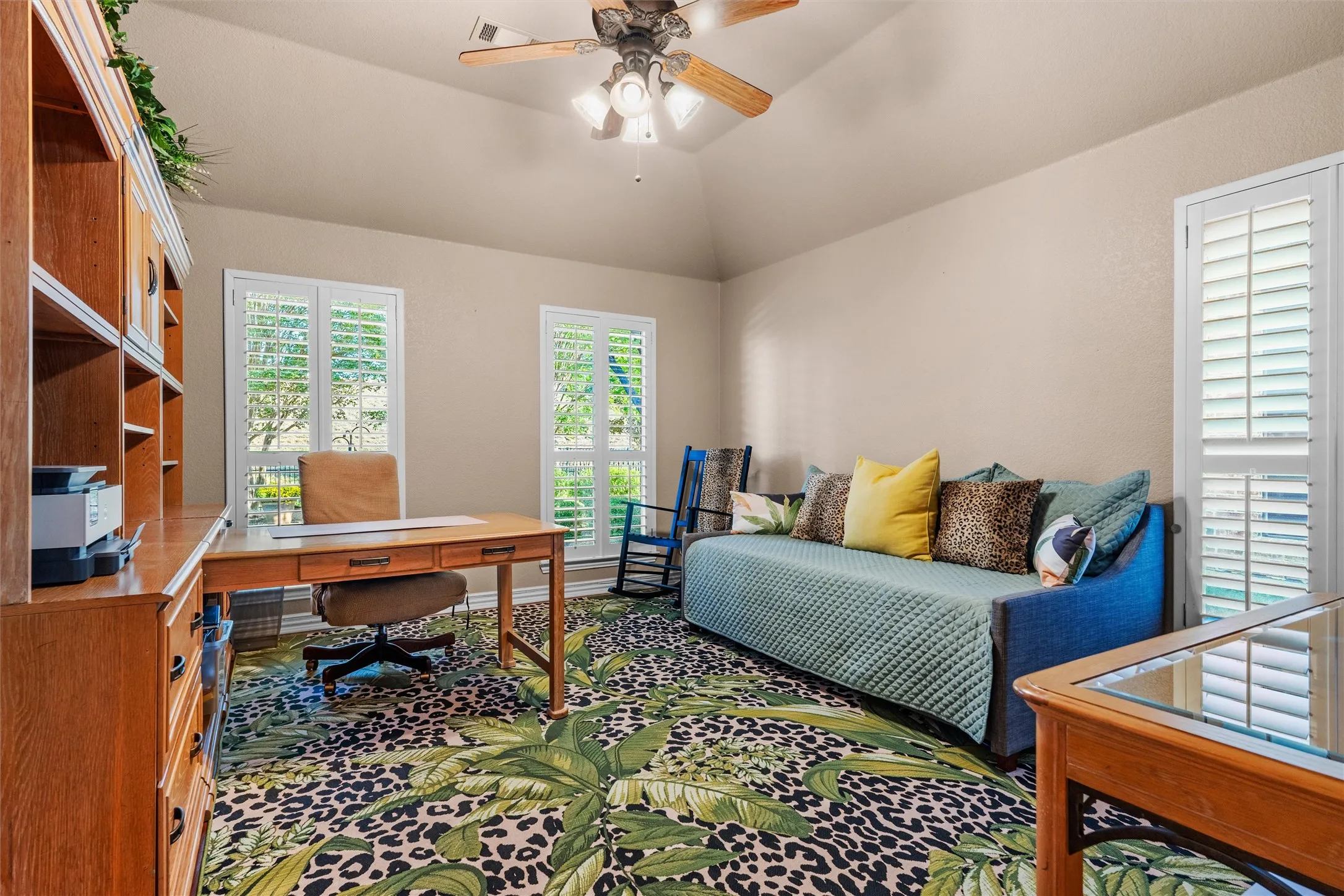 3rd Bedroom/Office vaulted ceiling, ceiling fan, white plantation shutters