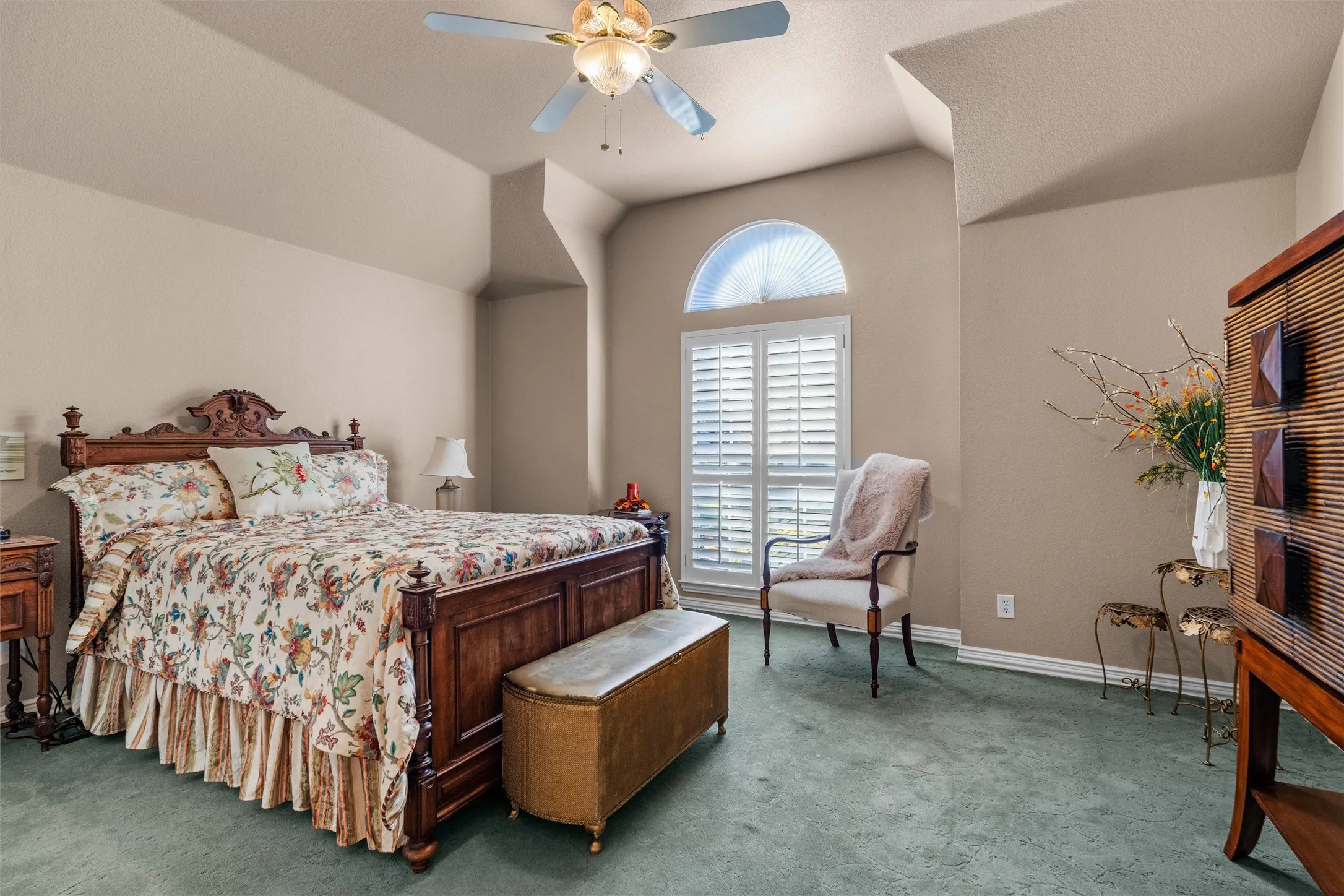 2nd Bedroom vaulted ceilings, a semi-circular transom window, and plantation shutters