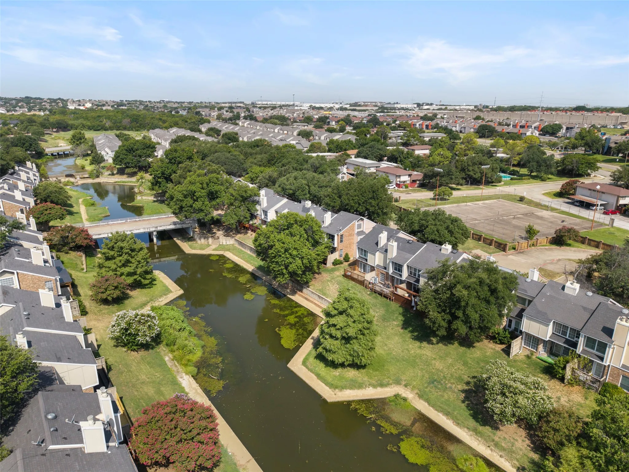 Waterfront property with multi-level dwellings, private decks, and mature trees