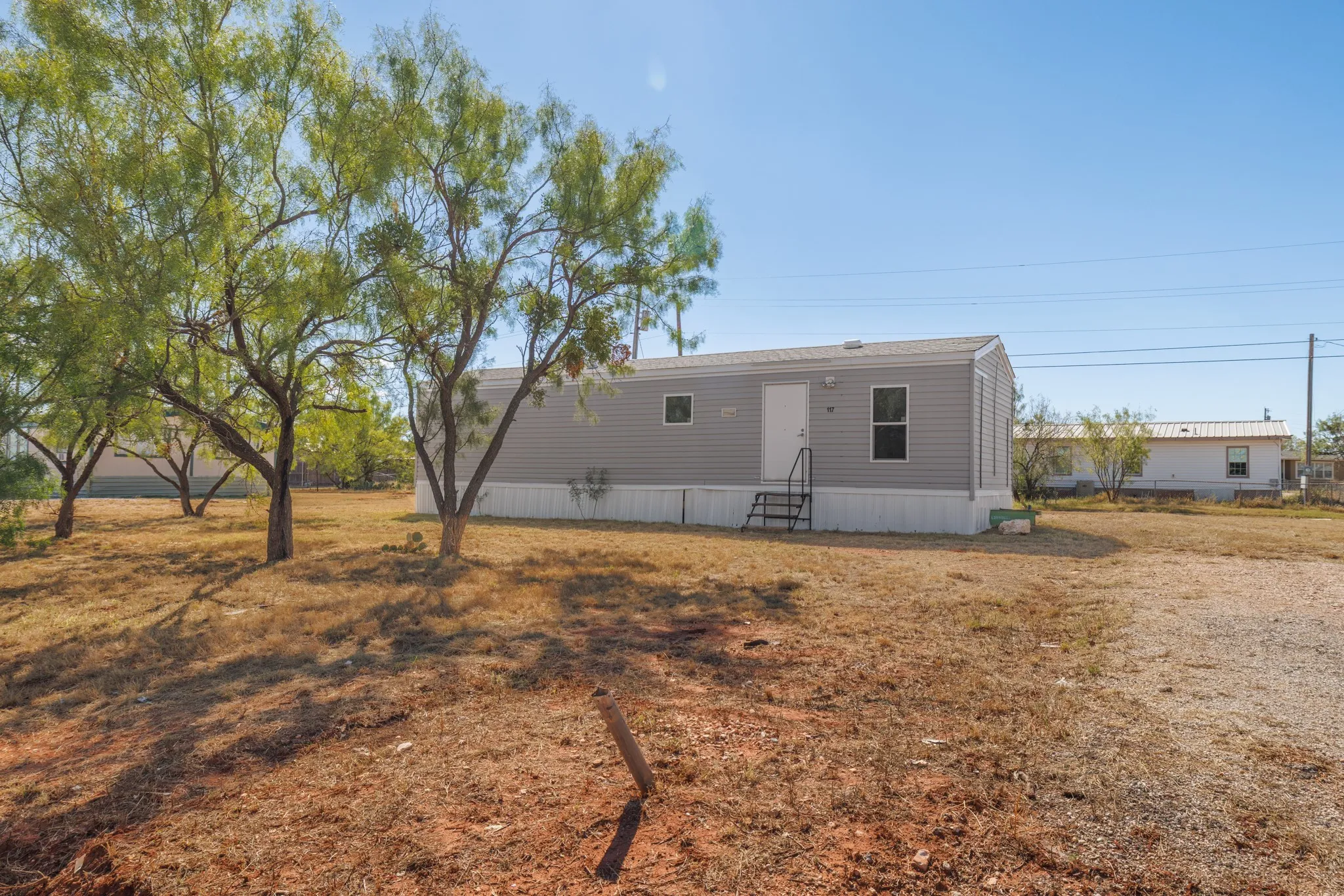 Mobile Home For Sale in Taylor County , 117 Seminole Street, Tye, Texas 79563, 2 Bedroom, 1 Bathroom, Garage spaces, 658 Sqft, built in 2017, mls#21400393, Real Estate Agent in Tye, Homes For Sale in Taylor county, Homes For Sale in Tye, Realtor in Tye Texas, Real Estate Brokerage Independent Realty Texas, Luminita Cordes Realtor