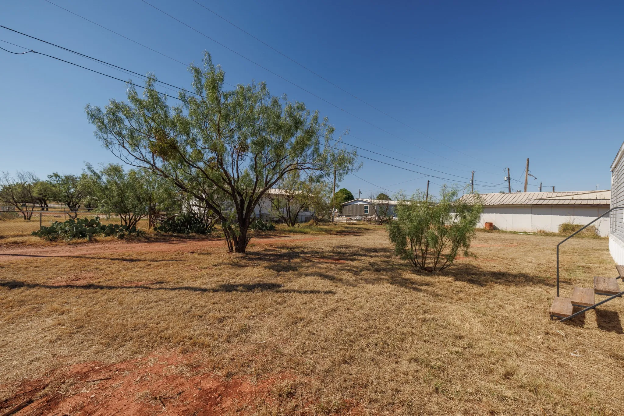 Mobile Home For Sale in Taylor County , 117 Seminole Street, Tye, Texas 79563, 2 Bedroom, 1 Bathroom, Garage spaces, 658 Sqft, built in 2017, mls#21400393, Real Estate Agent in Tye, Homes For Sale in Taylor county, Homes For Sale in Tye, Realtor in Tye Texas, Real Estate Brokerage Independent Realty Texas, Luminita Cordes Realtor