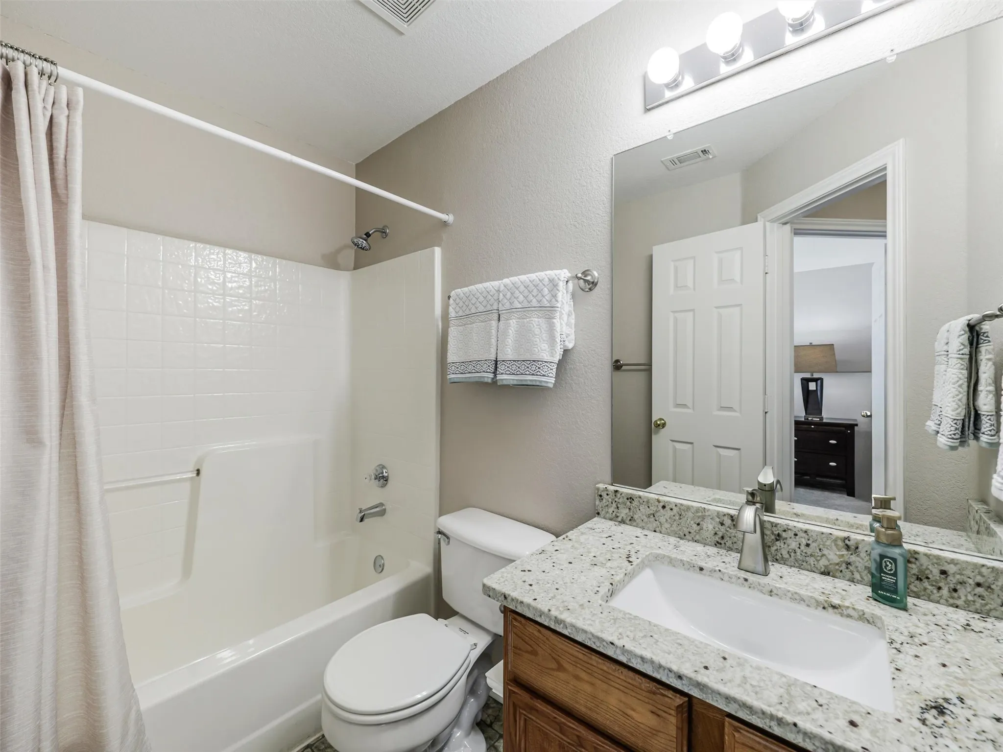 shared bath with granite counters