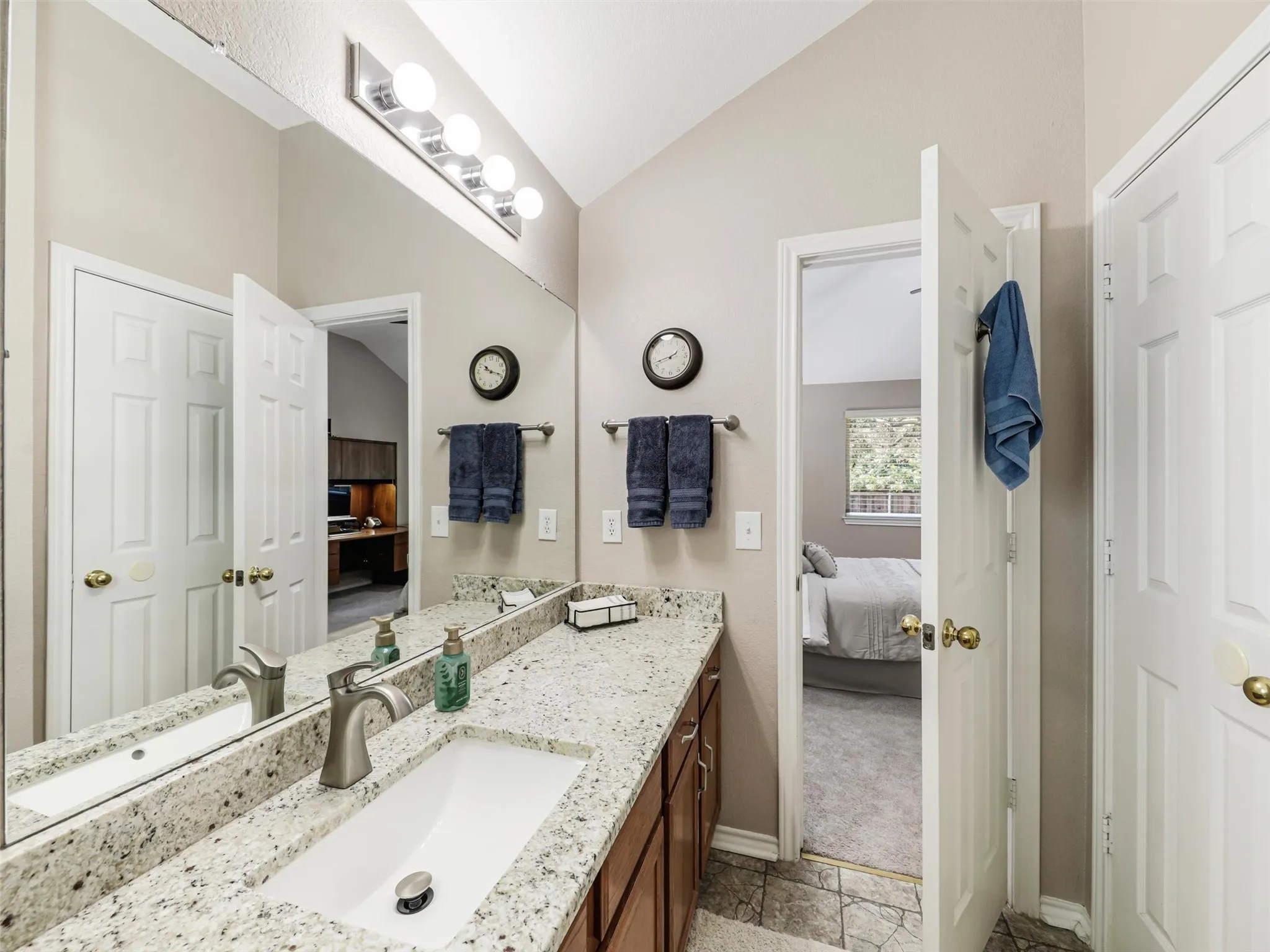 Granite counters and linen storage
