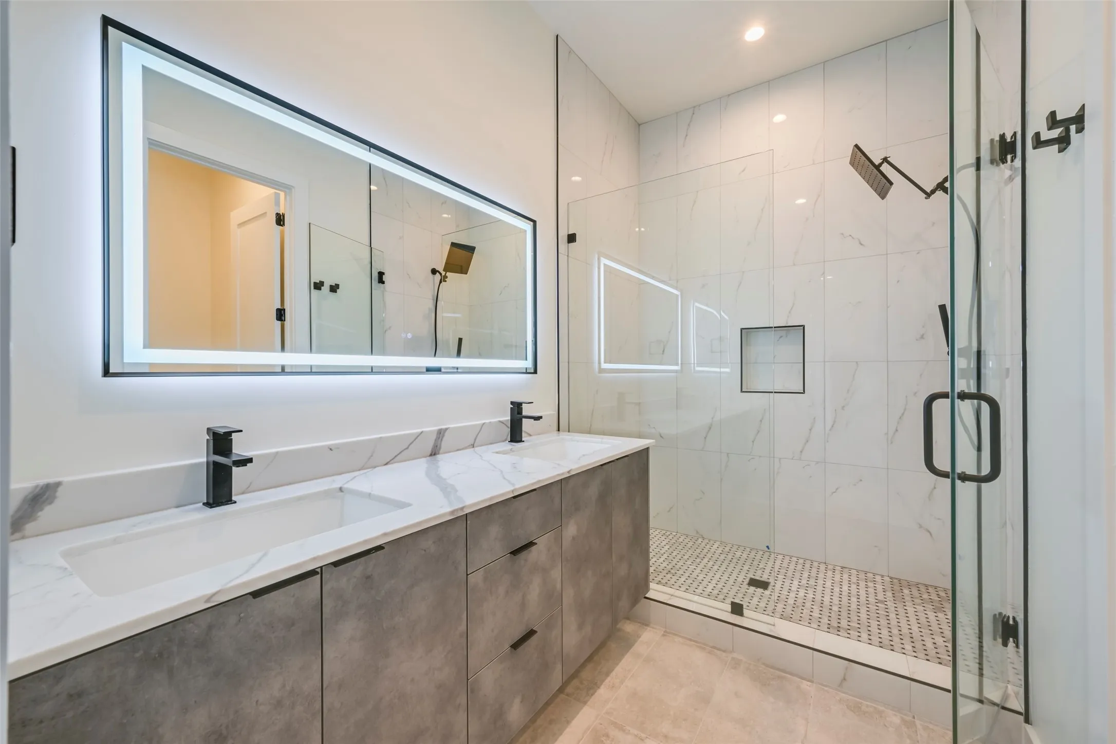 Double vanity with undermount sinks and matte black fixtures