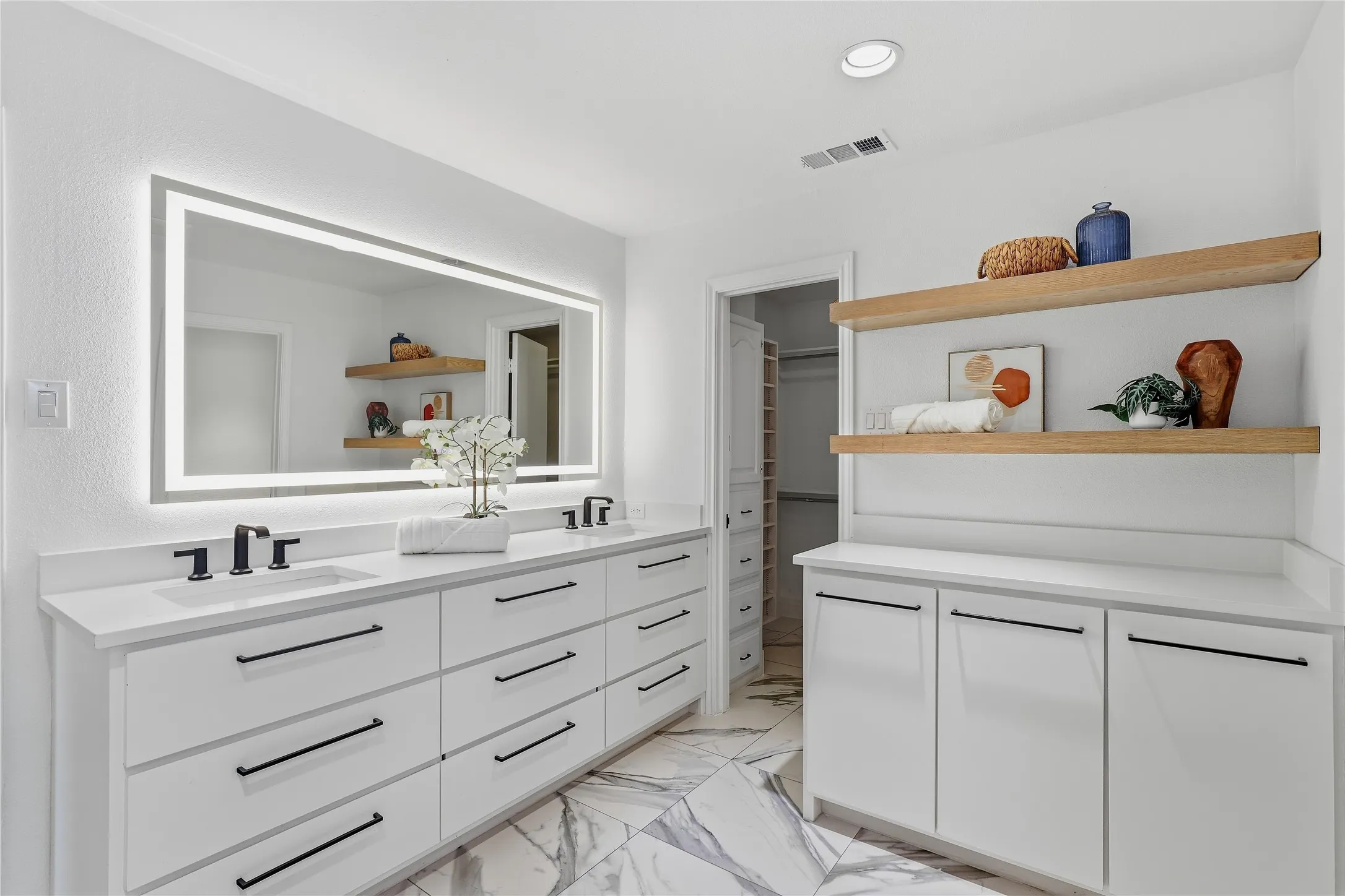 Dual vanity with rectangular undermount sinks and matte black fixtures