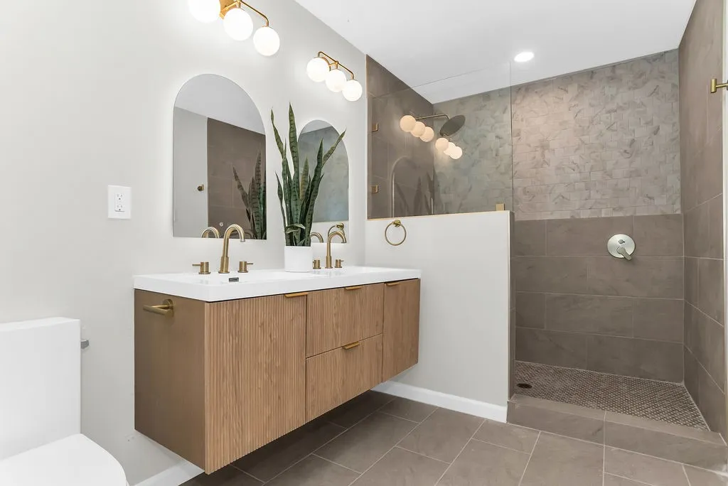 Primary bath double vanity and walk-in tile shower