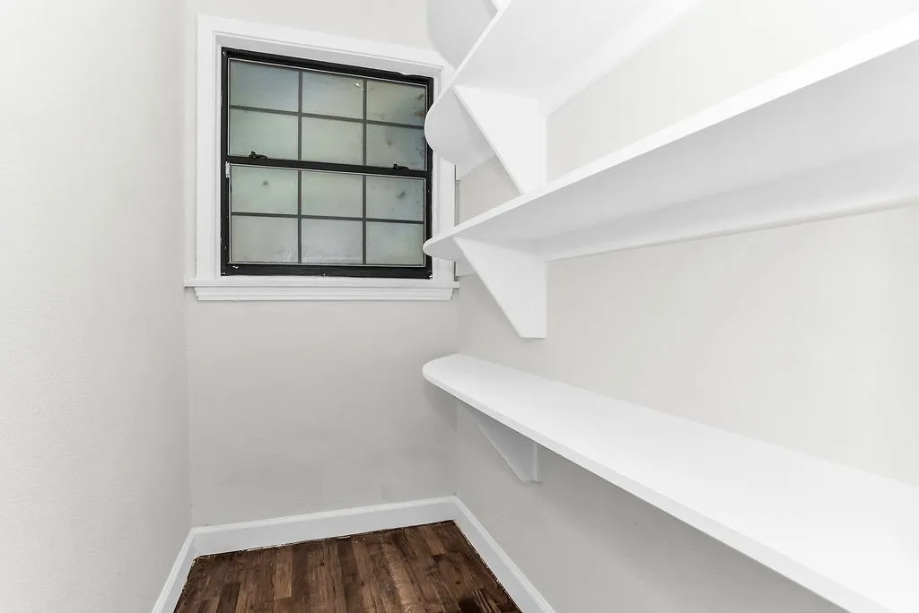Walk-in pantry with built-in shelving