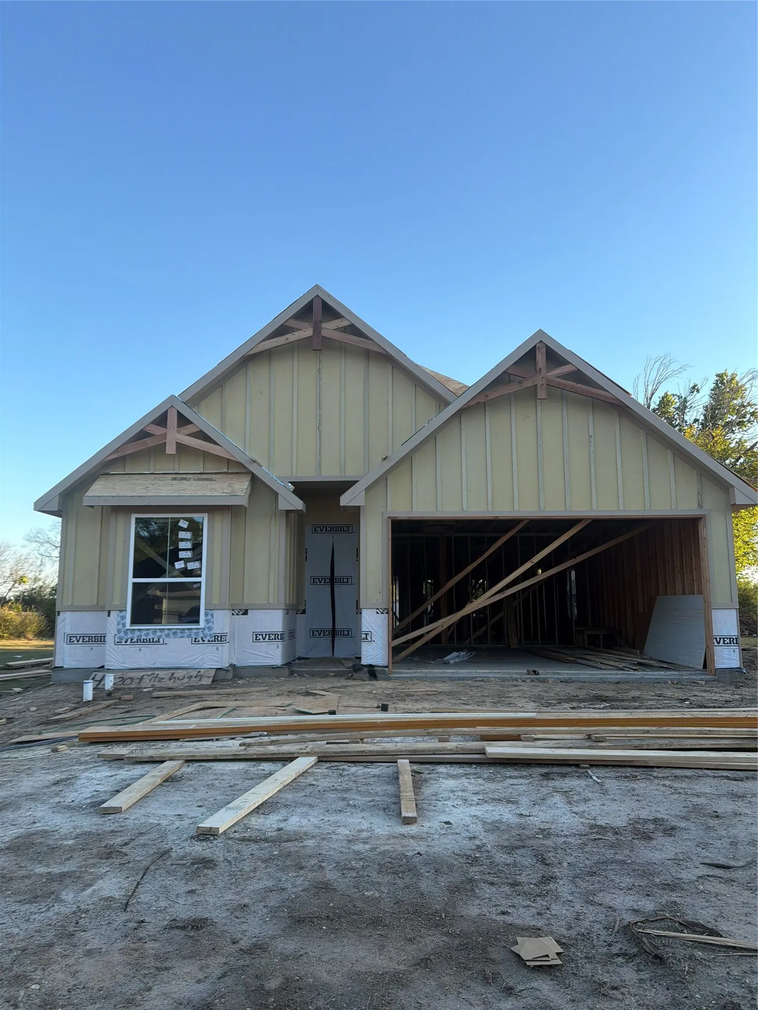Gable rooflines with exposed timber accents
