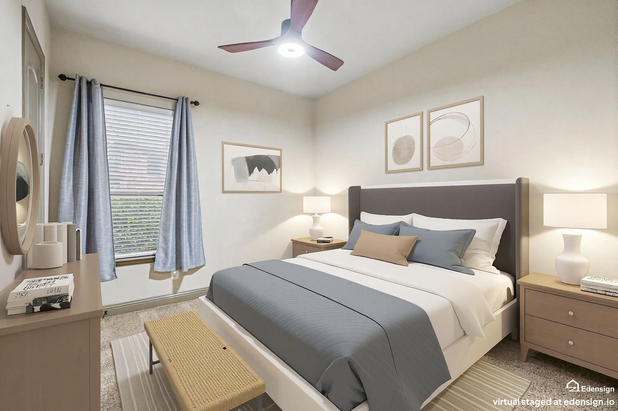 Spacious primary bedroom with ceiling fan and integrated lighting, neutral wall finishes, and abundant natural light from large multi-pane windows