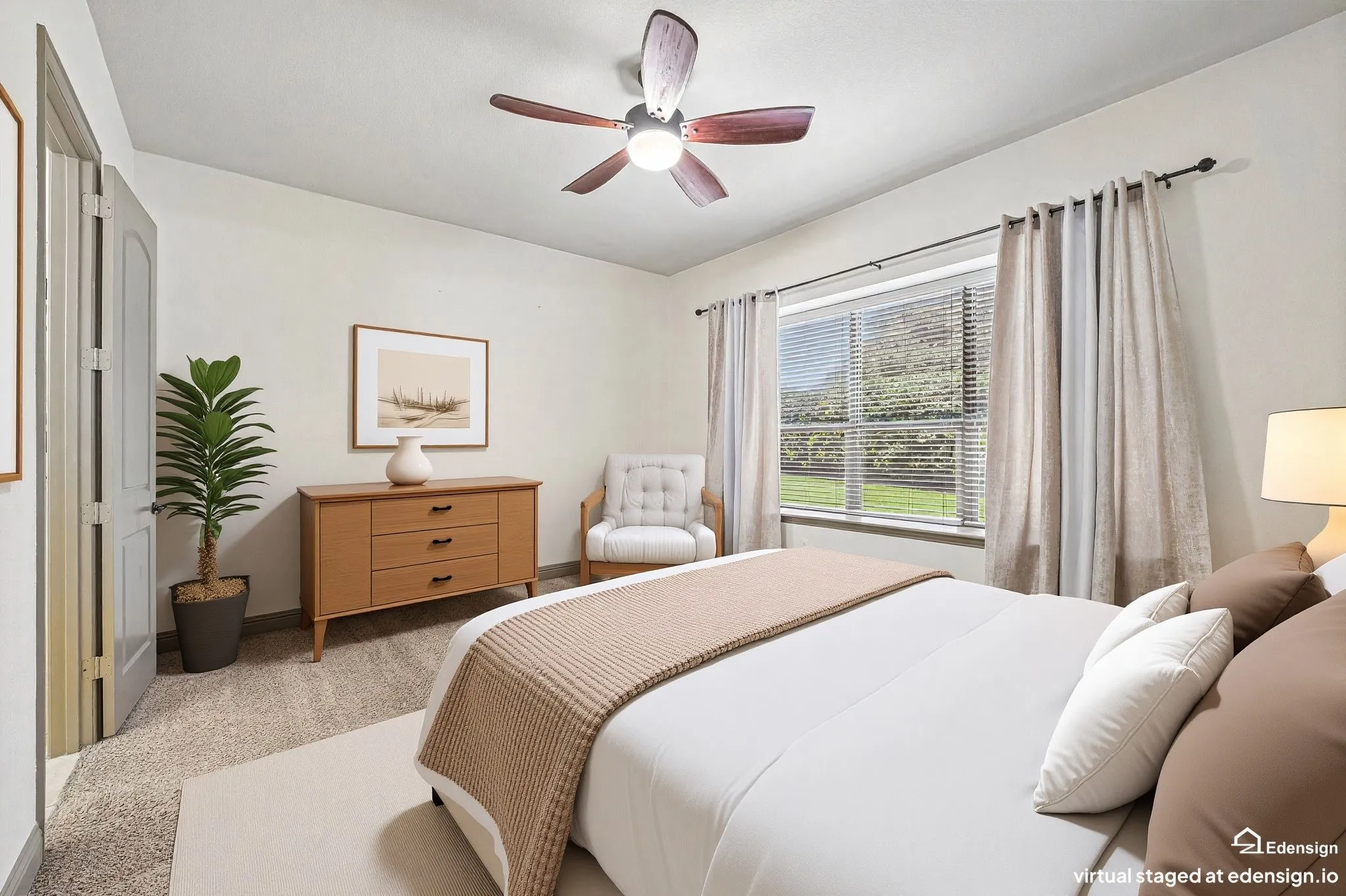 Textured wall finish, ceiling fan with integrated lighting, paneled interior doors, and neutral carpeting. Virtually Staged.