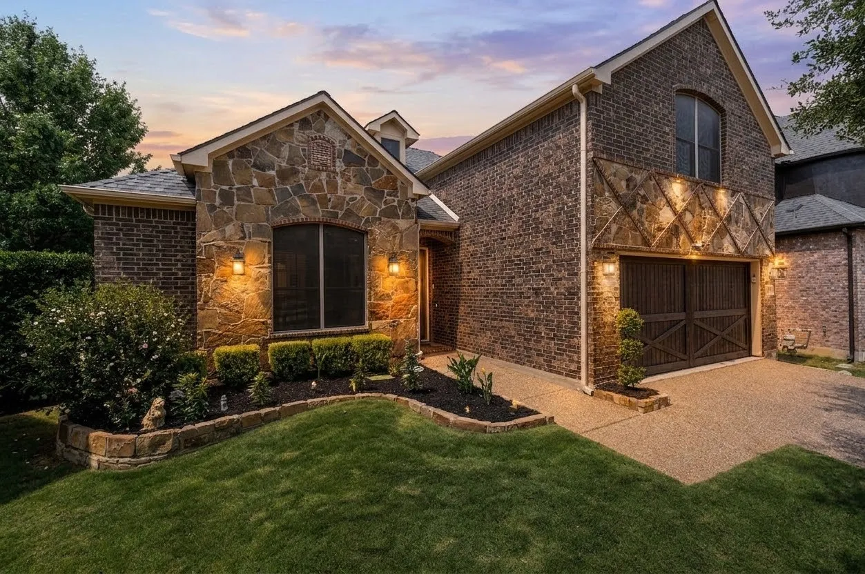 Elegant brick exterior with stone accents and arched architectural detailing
