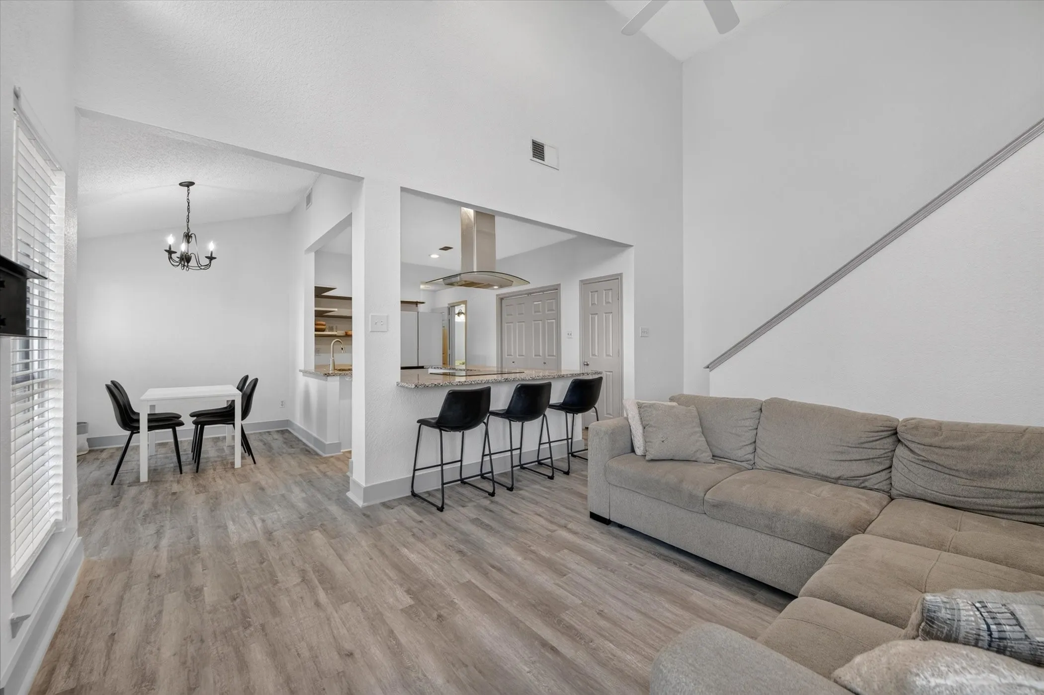 Open floor plan with breakfast bar in the kitchen make this space great for entertaining