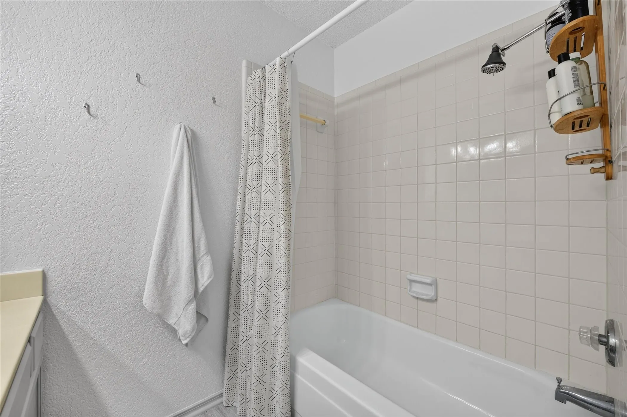 Fresh paint and flooring in the bathrooms give this space a clean and modern feel