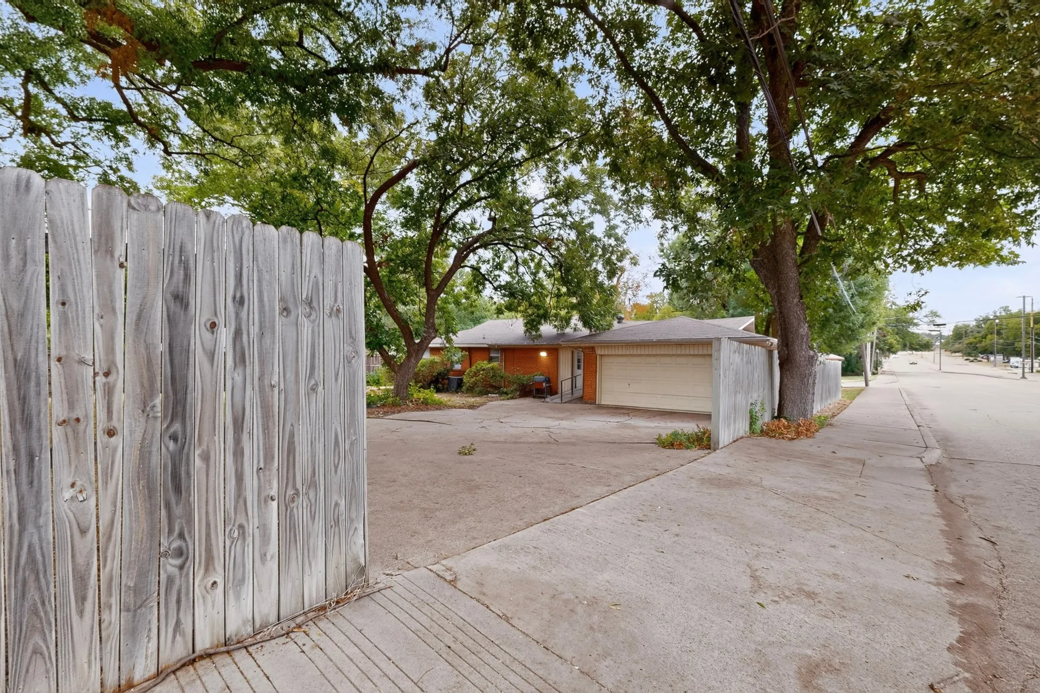 Wood fence privacy gate and perimeter fencing