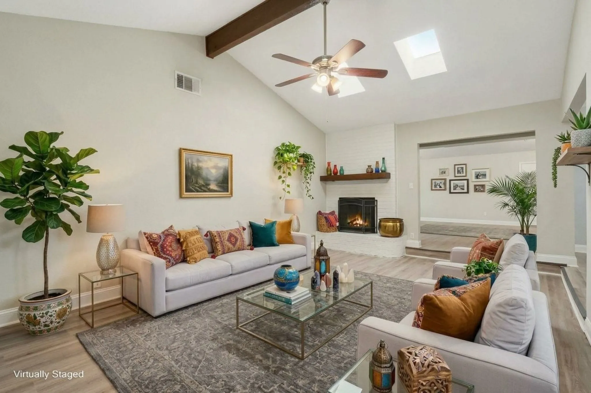 Virtually Staged Living room which opens to eat-in kitchen, dining area and large family room