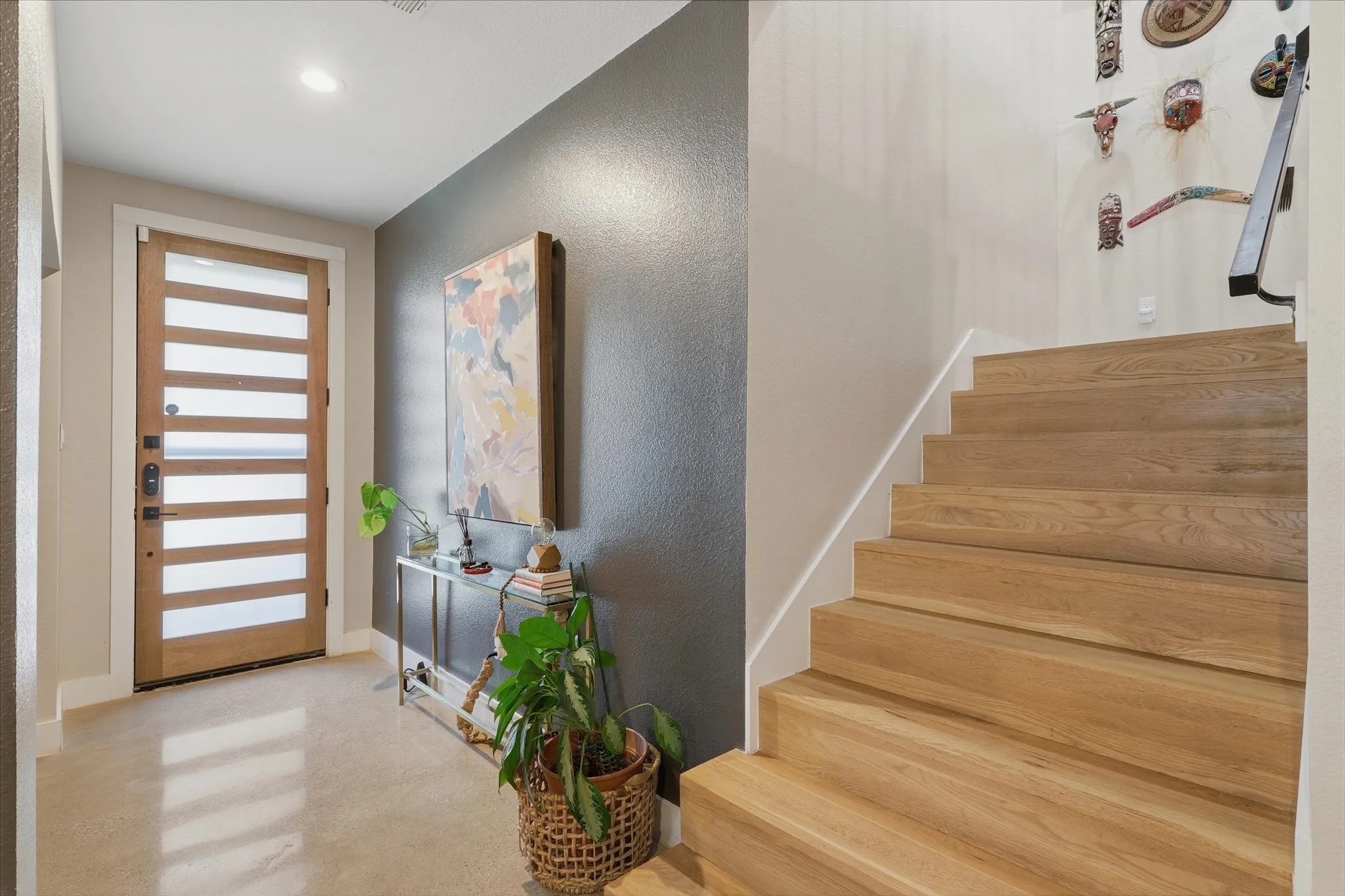 Modern wood-finish entry door with horizontal glass panels