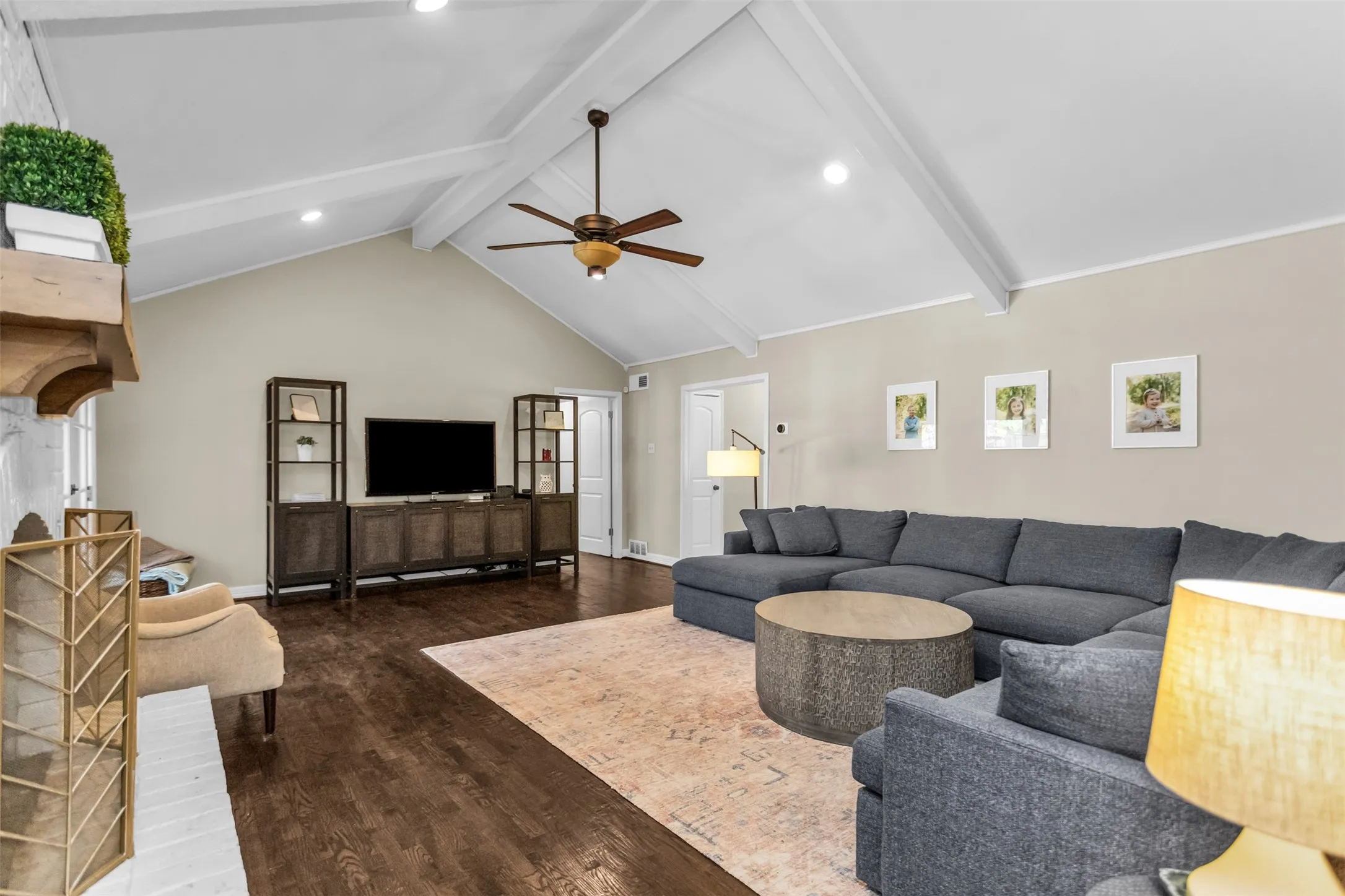 Vaulted ceiling with exposed beams, recessed lighting, ceiling fan, and wood-finish​​‌​​​​‌​​‌‌​‌‌​​​‌‌​‌​‌​‌​​​‌​​ flooring