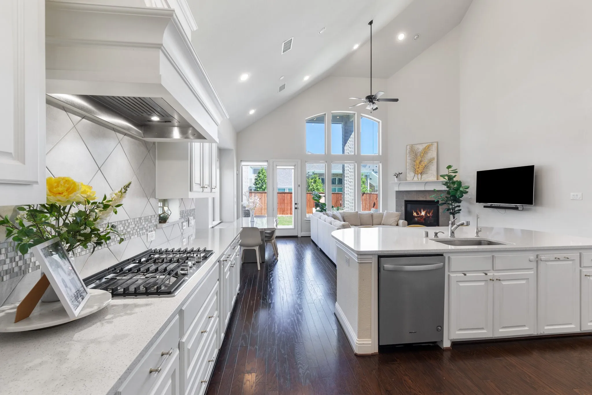 Beautiful cabinets and counters highlight the gourmet's delight of a kitchen.
