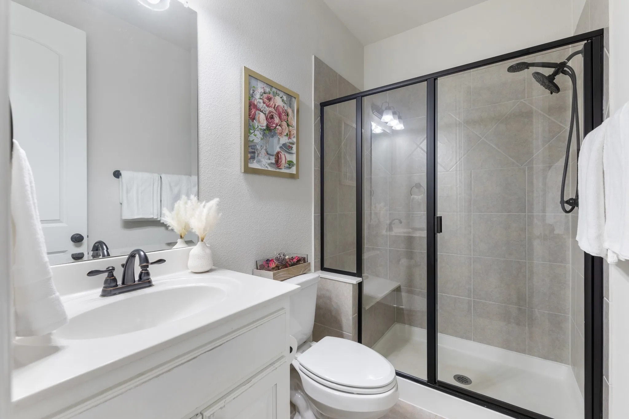 An additional full bath downstairs