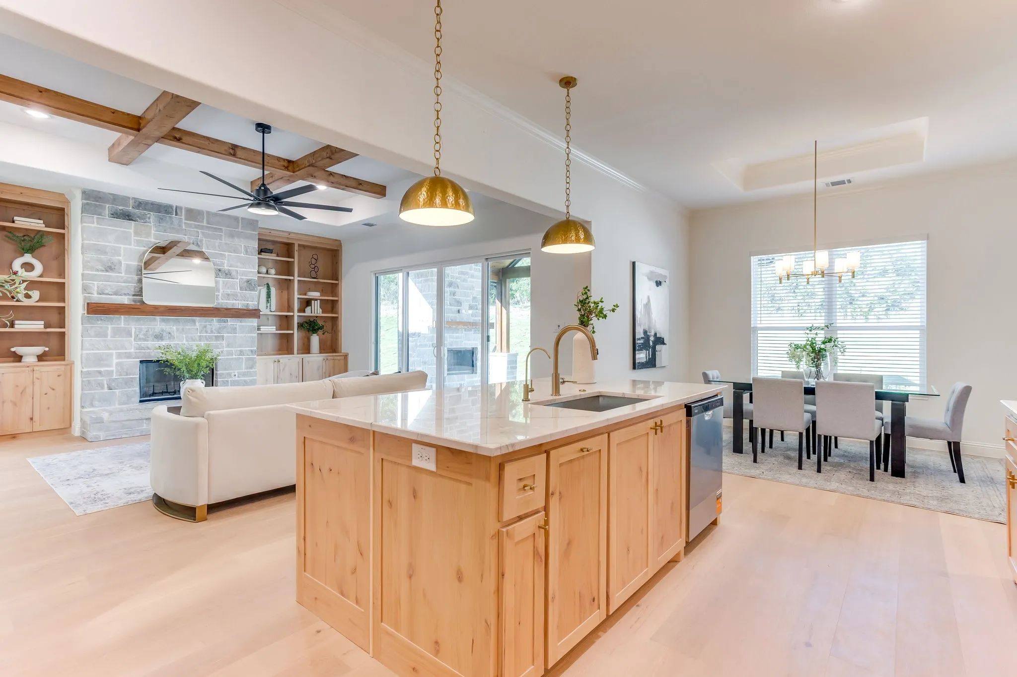 Kitchen with Quartzite countertops, 36" gas cooktop, plumbed for gas-propane, custom cabinetry to the ceiling and a butler pantry
