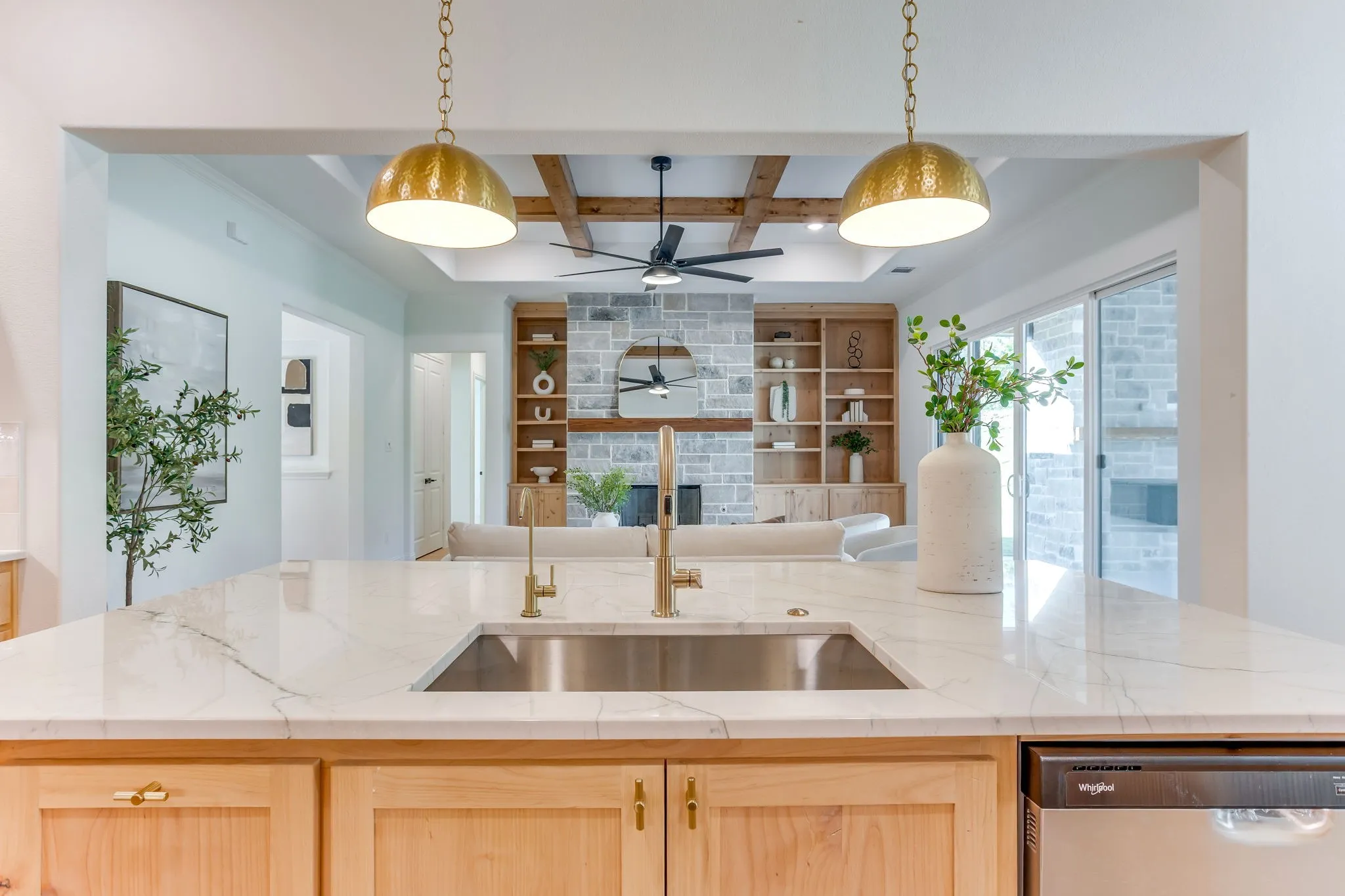Kitchen with Quartzite countertops, 36" gas cooktop, plumbed for gas-propane, custom cabinetry to the ceiling and a butler pantry