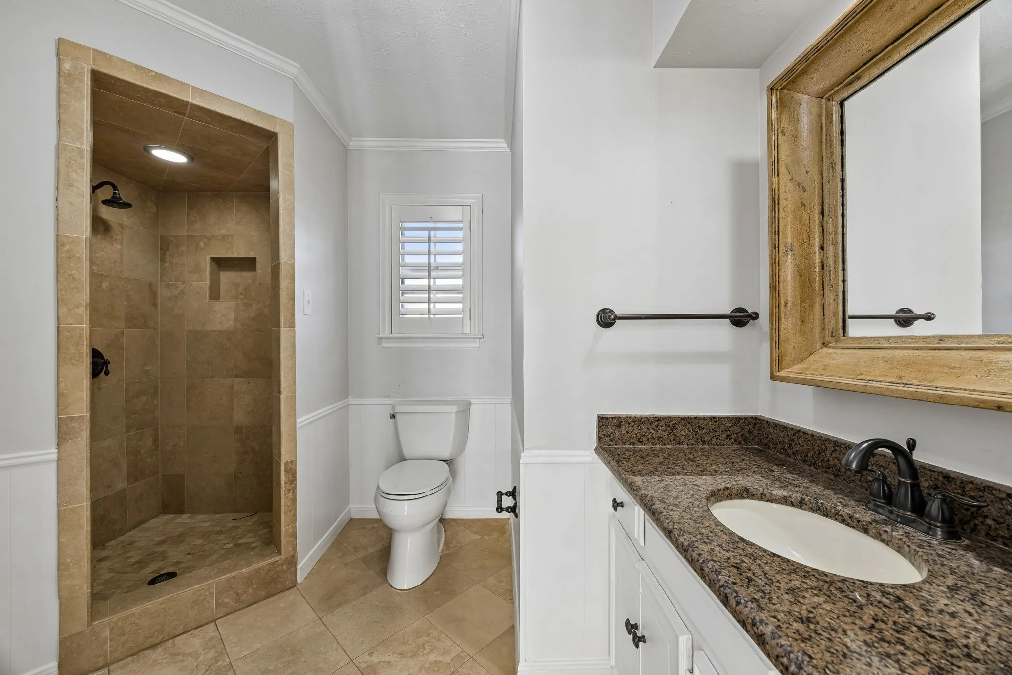 Guest bathroom off guest bedroom and kitchen.