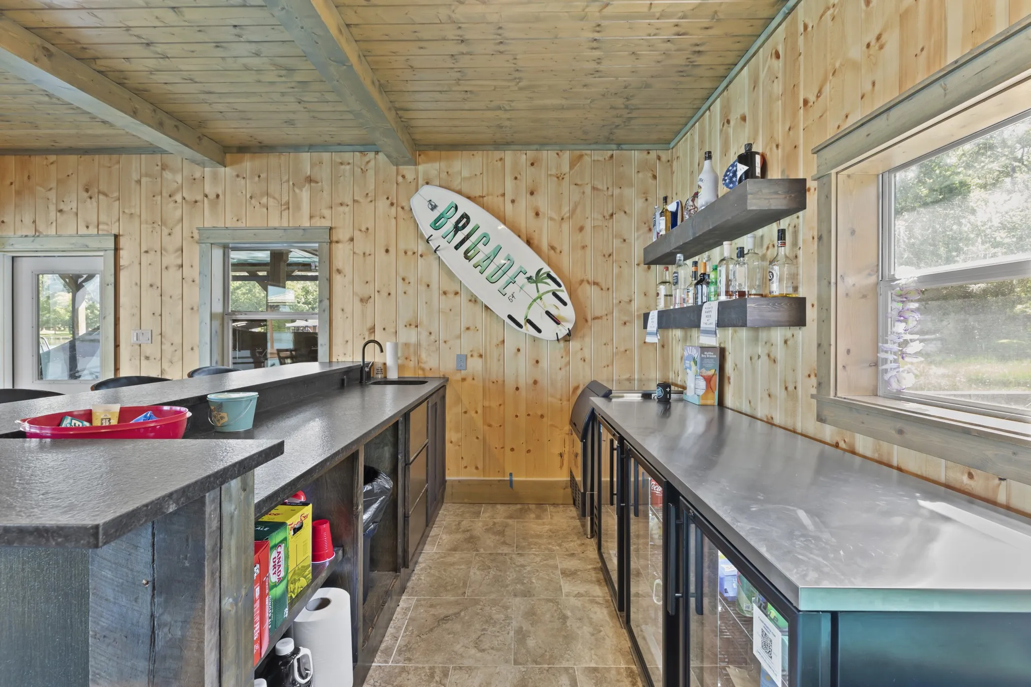 Wood plank walls and ceiling with exposed beams
